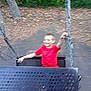 Christopher is registered to the contest to win money with this photo: activity, boy, chain, child, daytime, fun, happy, leaves, metal, motion_blur, nature, outdoor, park, play, playground, recreation, red_shirt, smiling, swing, trees