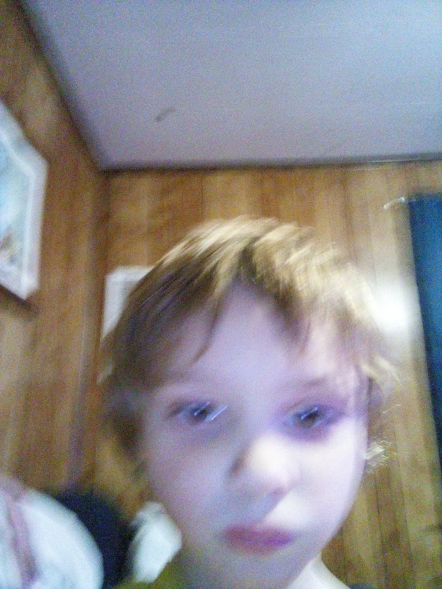 Chris is registered to the contest to win money with this photo: bangs, cheek, child, crop, ear, eyebrow, eyelash, forehead, fun, hair_coloring, happy, iris, jaw, nose, person, photo_caption, portrait, room, selfie, toddler