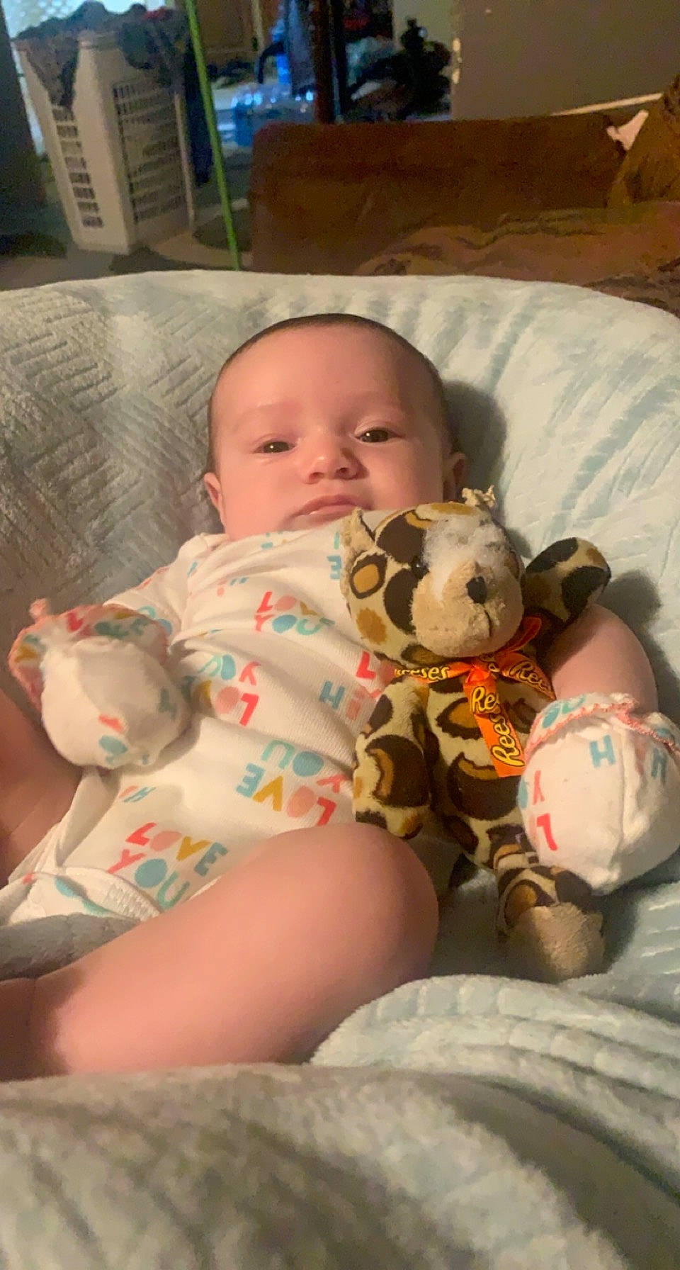 Savannah joined the competition — help win amazing prizes! baby, baby_toddler_clothing, bedtime, cheek, child, comfort, fun, head, human_body, human_leg, lap, linens, mammal, mouth, person, sitting, skin, thigh, toddler, toy