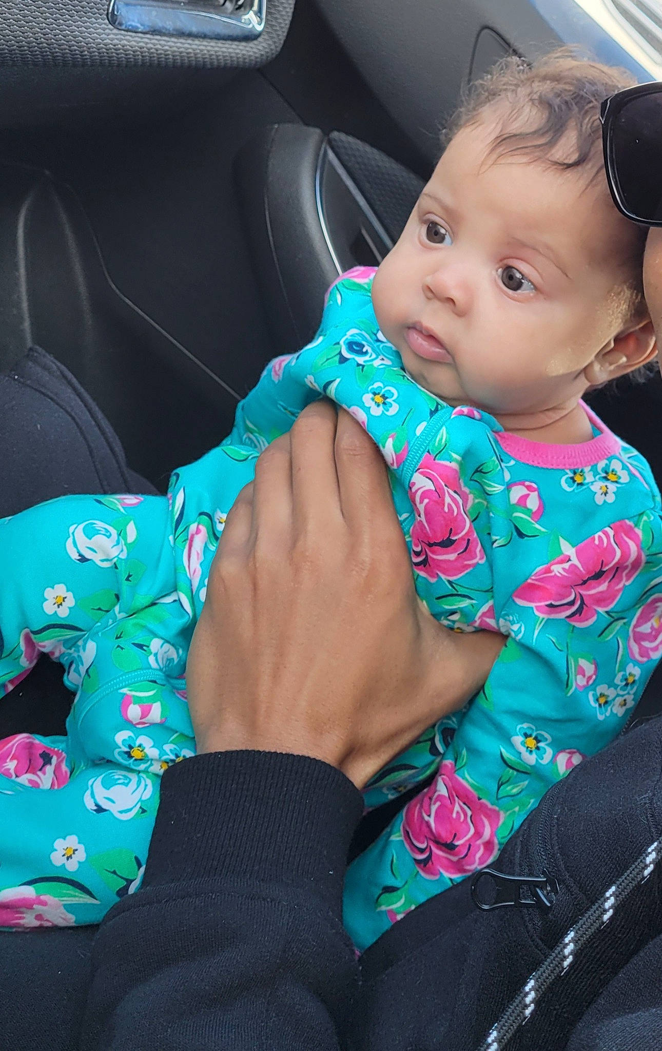 Aria joined the competition — help win amazing prizes! arm, azure, baby, baby_toddler_clothing, car_seat, child, comfort, cool, electric_blue, face, finger, gesture, hairstyle, hand, happy, nail, person, sleeve, steering_wheel, toddler