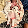 baby, bed, bedroom, blanket, couch, cushion, face, furniture, head, homedecor, indoors, newborn, person, photography, plush, portrait, quilt, room, sleeping, toy