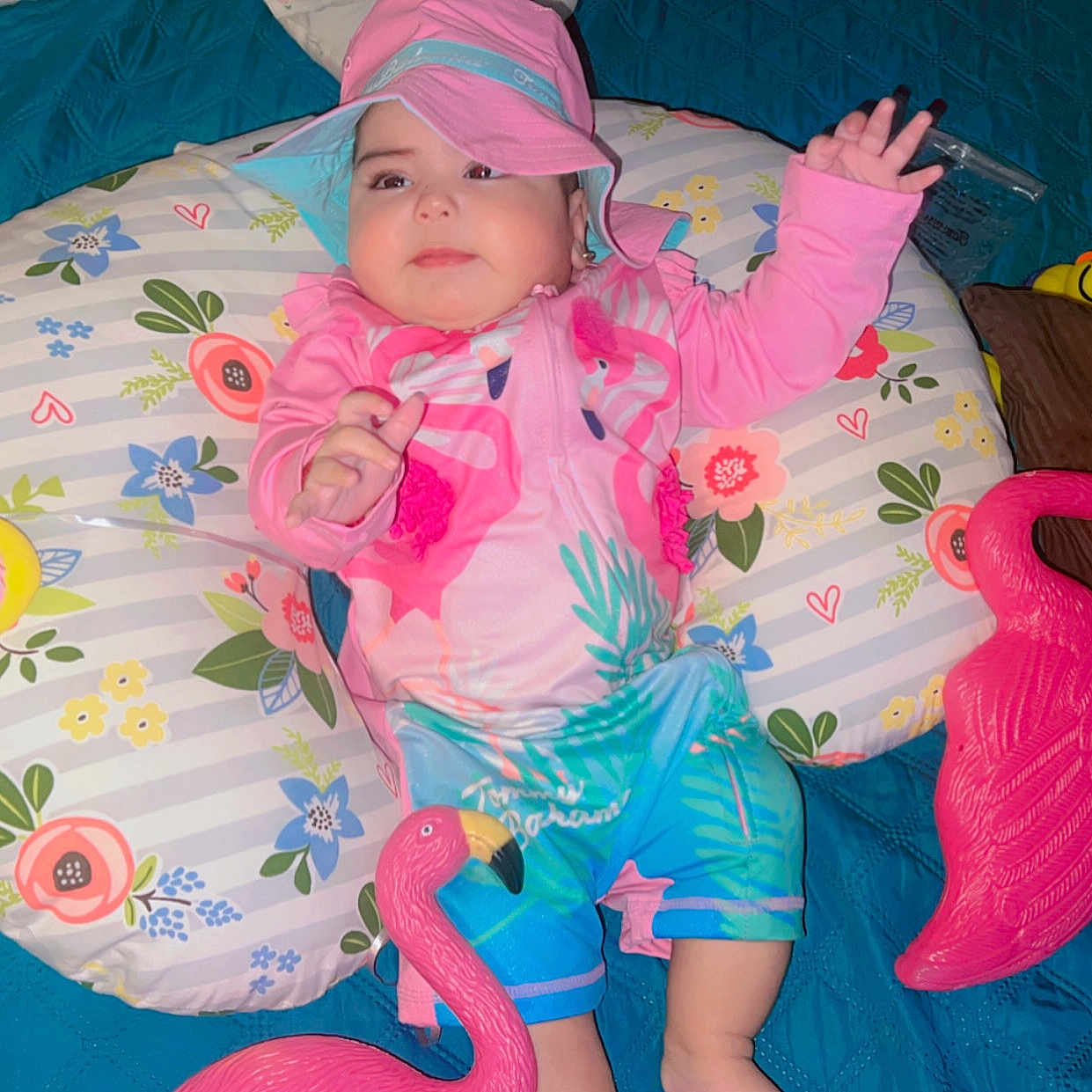 Karla Benavides is registered to the contest to win money with this photo: animal, baby, balloon, bird, cap, clothing, coat, couch, cushion, face, furniture, hat, head, homedecor, indoors, inflatable, person, photography, pillow, portrait