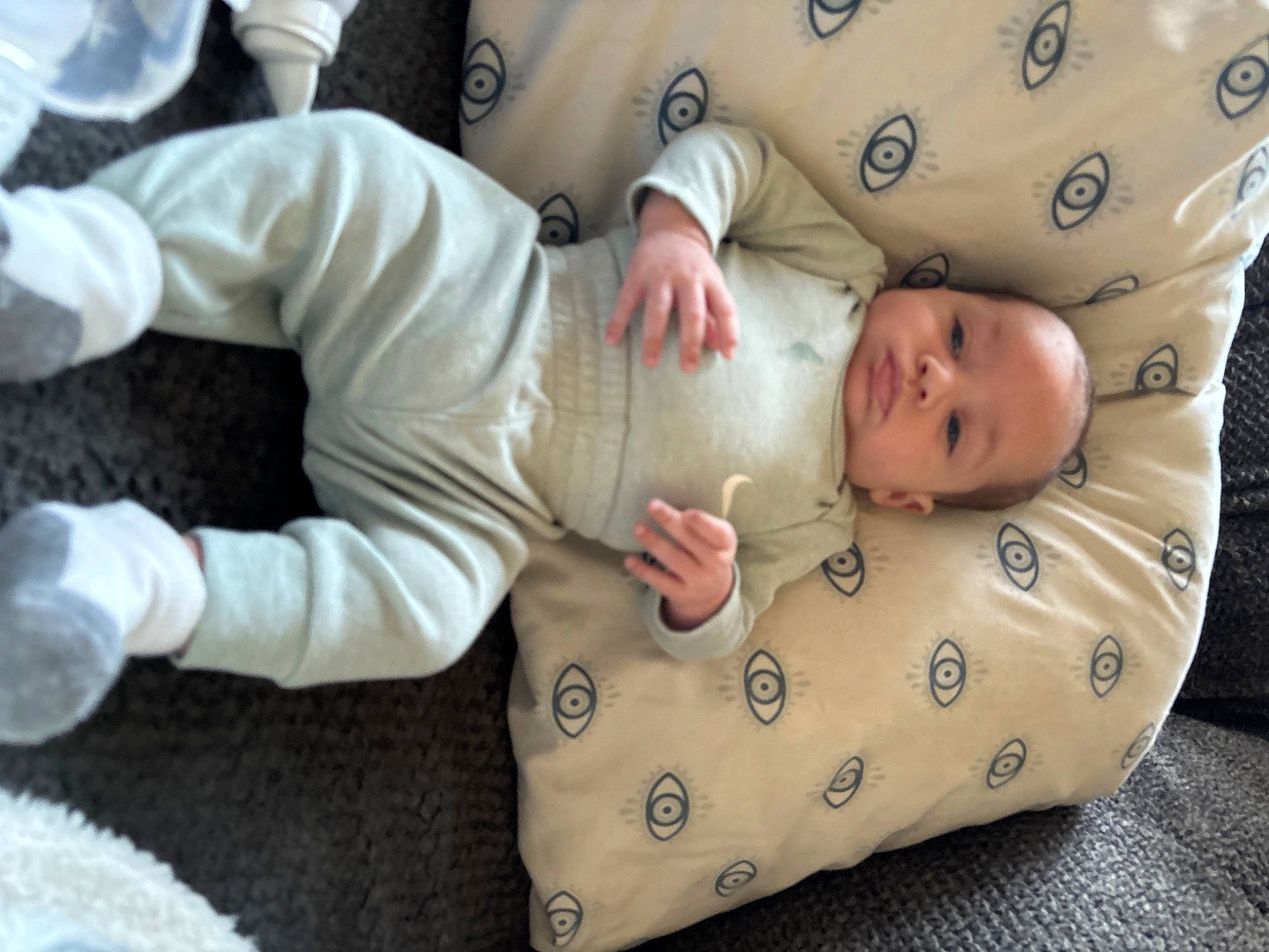 Karsyon Smith is registered to the contest to win money with this photo: baby, baby_products, baby_sleeping, baby_toddler_clothing, bedding, bedtime, child, comfort, flooring, gesture, hand, linens, pattern, person, room, sitting, sleep, sleeve, toddler, tree