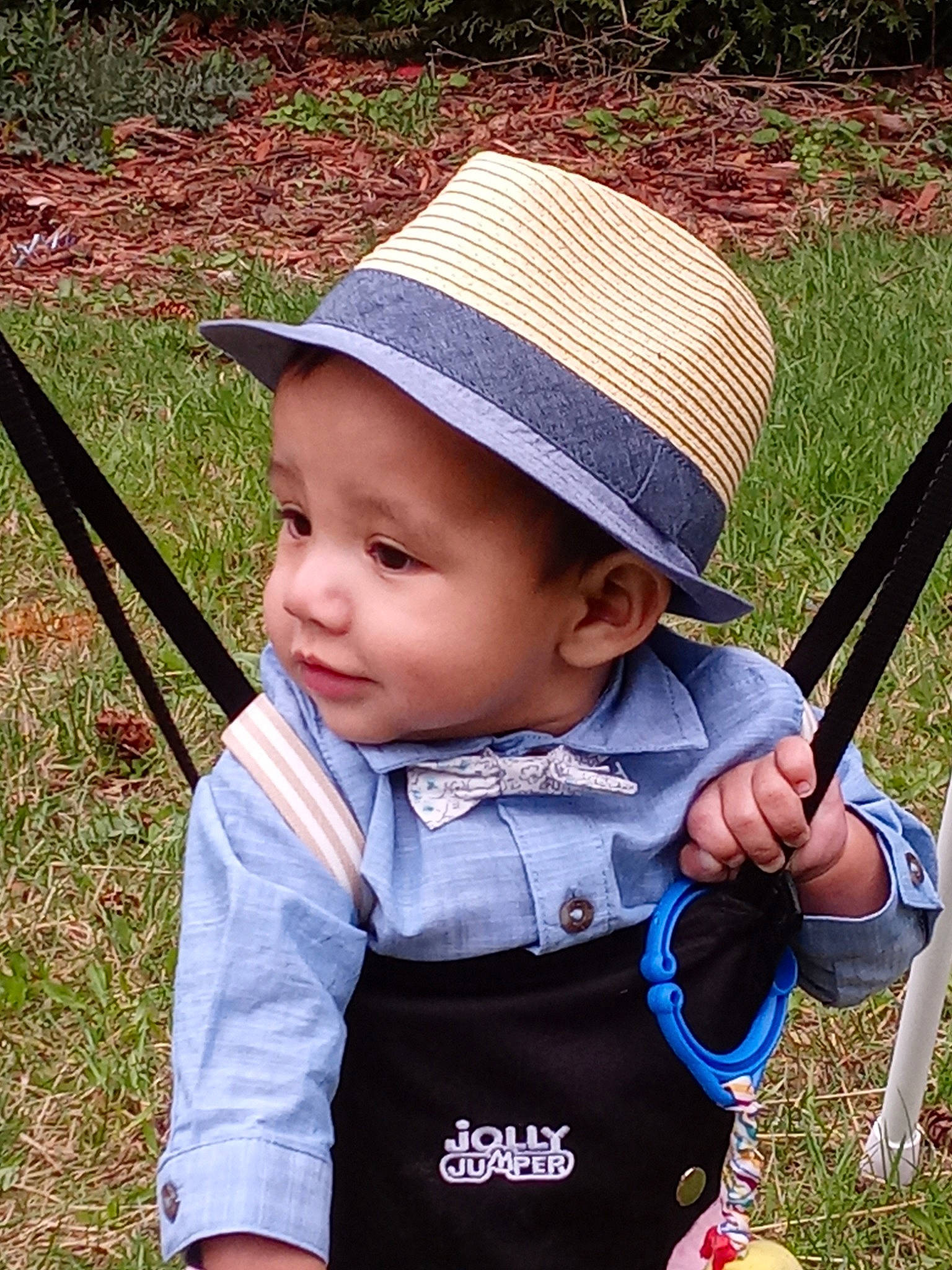 Ronin is registered to the contest to win money with this photo: baby, baby_toddler_clothing, cap, child, cool, electric_blue, face, fun, grass, hat, headwear, lawn, leaf, people_in_nature, person, photograph, plant, product, recreation, skin