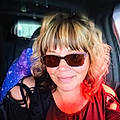 Kim M.