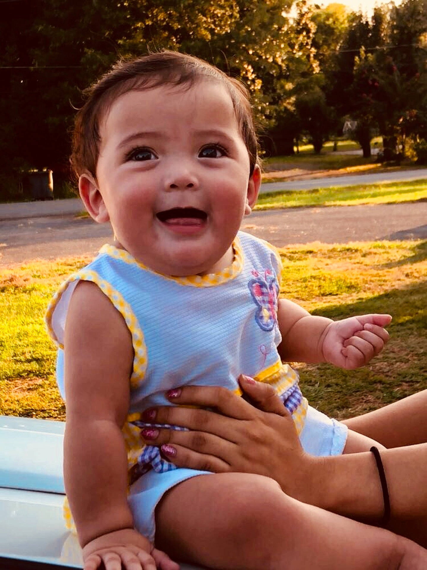 Katalaya is registered to the contest to win money with this photo: abdomen, boy, cheek, child, day, facial_expression, finger, fun, girl, hand, happiness, infant, mouth, person, play, sitting, skin, smile, summer, toddler