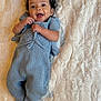 Willow joined the competition — help win amazing prizes! baby, infant, smiling, blue_outfit, headband, curly_hair, lying_down, blanket, knitted_clothing, happy, cute, small_feet, indoors, soft_texture, child, person, cozy, warm, portrait, expression
