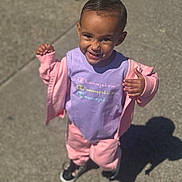 Novah joined the competition — help win amazing prizes! toddler, child, smiling, outdoor, pavement, shadow, purple_shirt, pink_jacket, pink_pants, black_shoes, sunlight, happy, person, casual_clothing, young_child, standing, daylight, cute, fashion, portrait