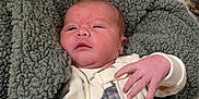 Ryker is registered to the contest to win money with this photo: architecture, baby, bed, blanket, building, childbirth, clothing, cushion, face, furniture, glove, head, homedecor, hospital, newborn, person, photography, portrait, quilt, sleeping