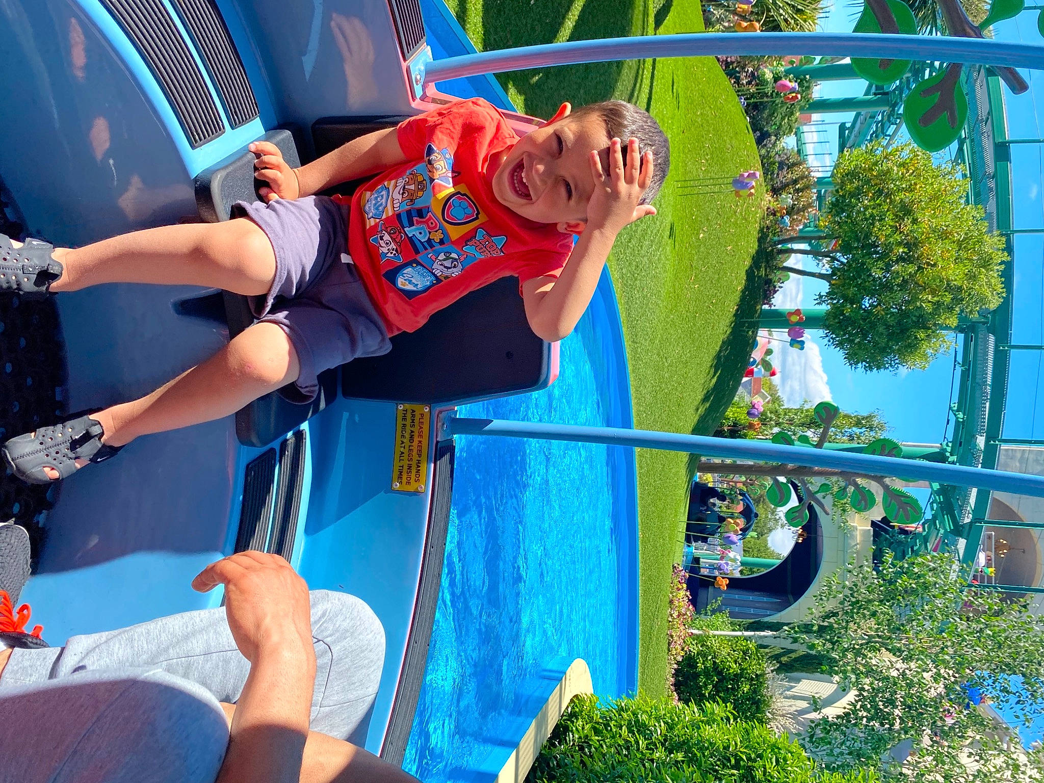 Ayan is registered to the contest to win money with this photo: blue, electric_blue, fun, grass, green, joy, leisure, nonbuilding_structure, outdoor_play_equipment, person, plant, playground, pole, recreation, shorts, sports_uniform, sportswear, summer, t_shirt, thigh