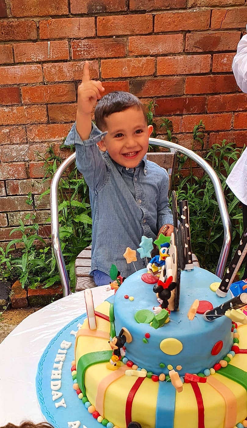 Ayan joined the competition — help win amazing prizes! birthday_cake, brick, cake, cake_decorating, cake_decorating_supply, chair, child, dessert, event, food, fun, happy, icing, joy, leisure, people, person, plant, recreation, shorts