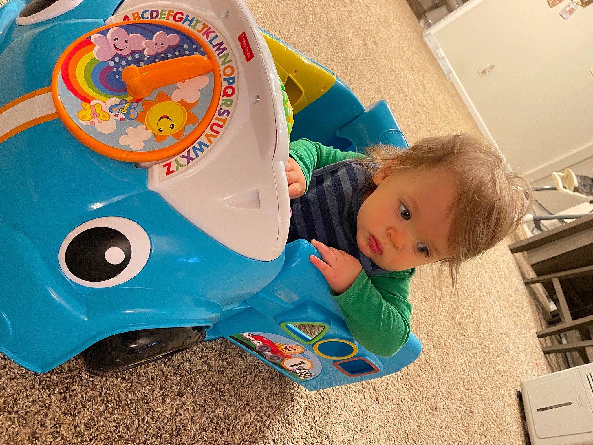 Archie joined the competition — help win amazing prizes! auto_part, automotive_design, automotive_exterior, automotive_wheel_system, baby, baby_products, baby_toddler_clothing, baby_toys, bumper, child, flooring, fun, leisure, machine, motor_vehicle, person, plastic, play, recreation, riding_toy