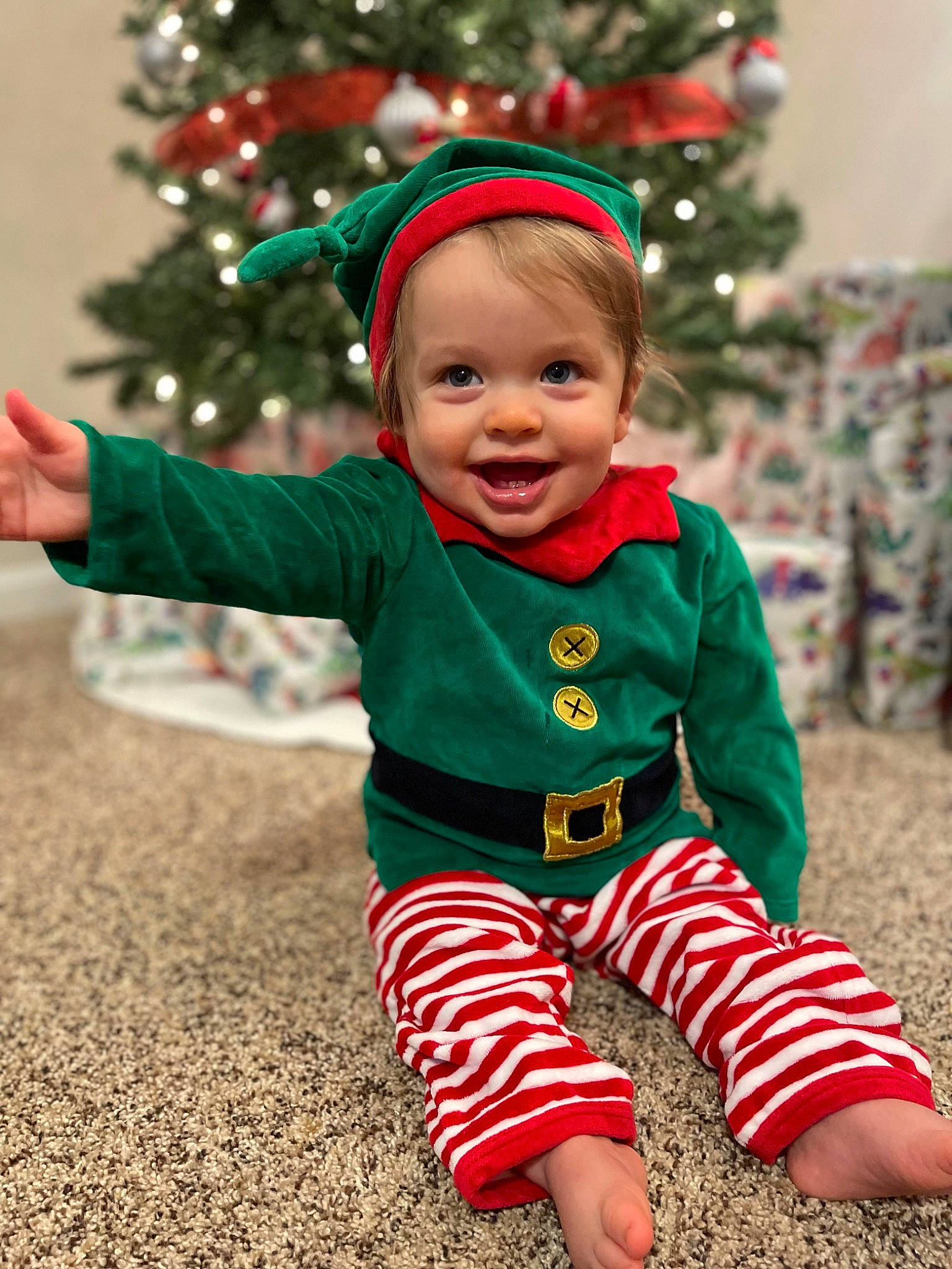 Archie joined the competition — help win amazing prizes! baby, baby_toddler_clothing, child, christmas, christmas_decoration, christmas_ornament, christmas_tree, event, face, fun, grass, green, happy, head, holiday, joy, people_in_nature, person, sleeve, smile