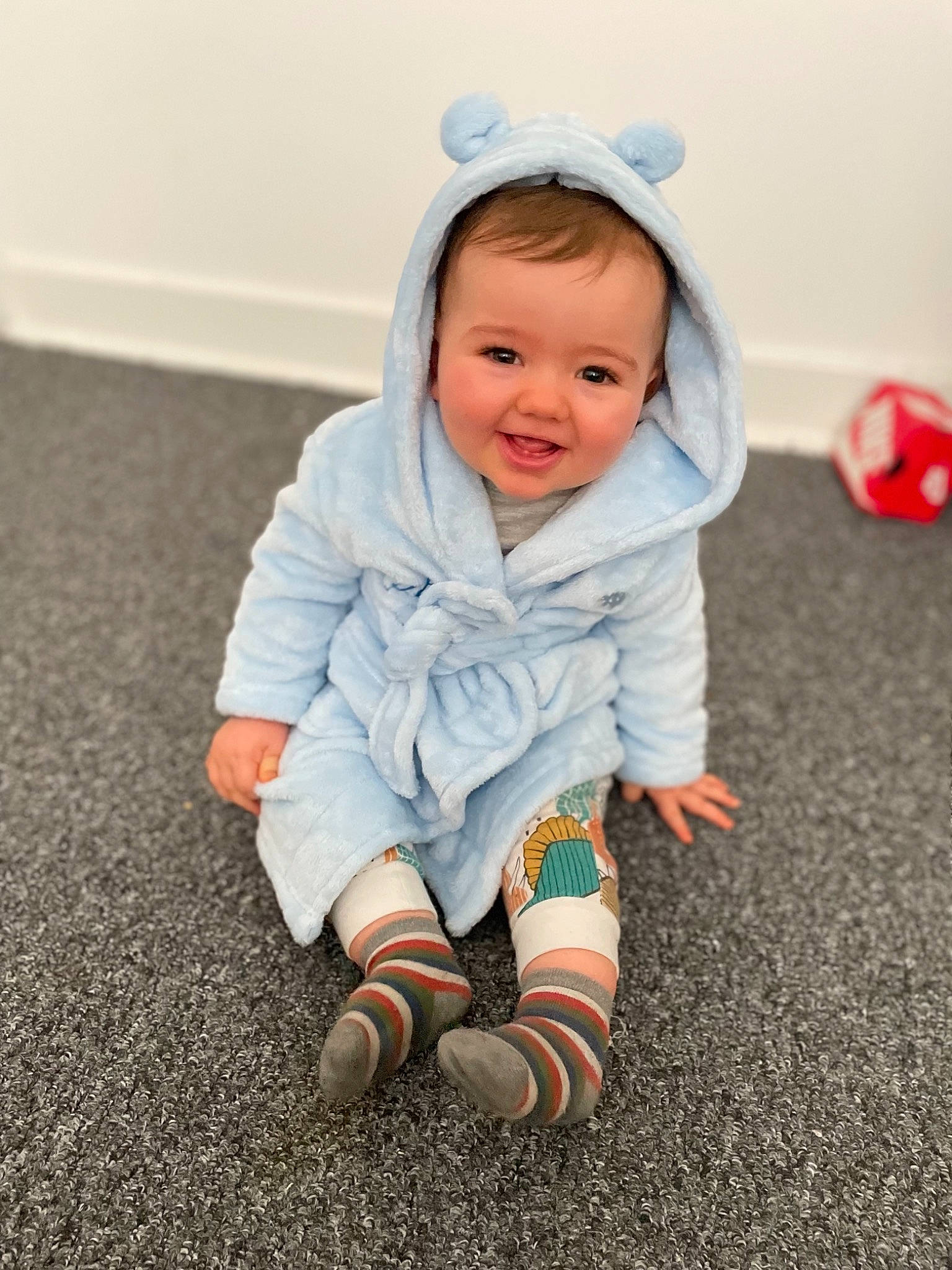 Koby joined the competition — help win amazing prizes! baby, baby_toddler_clothing, cap, child, eye, flooring, fun, grass, happy, joy, pattern, people_in_nature, person, plant, portrait_photography, sitting, sleeve, smile, toddler, toy