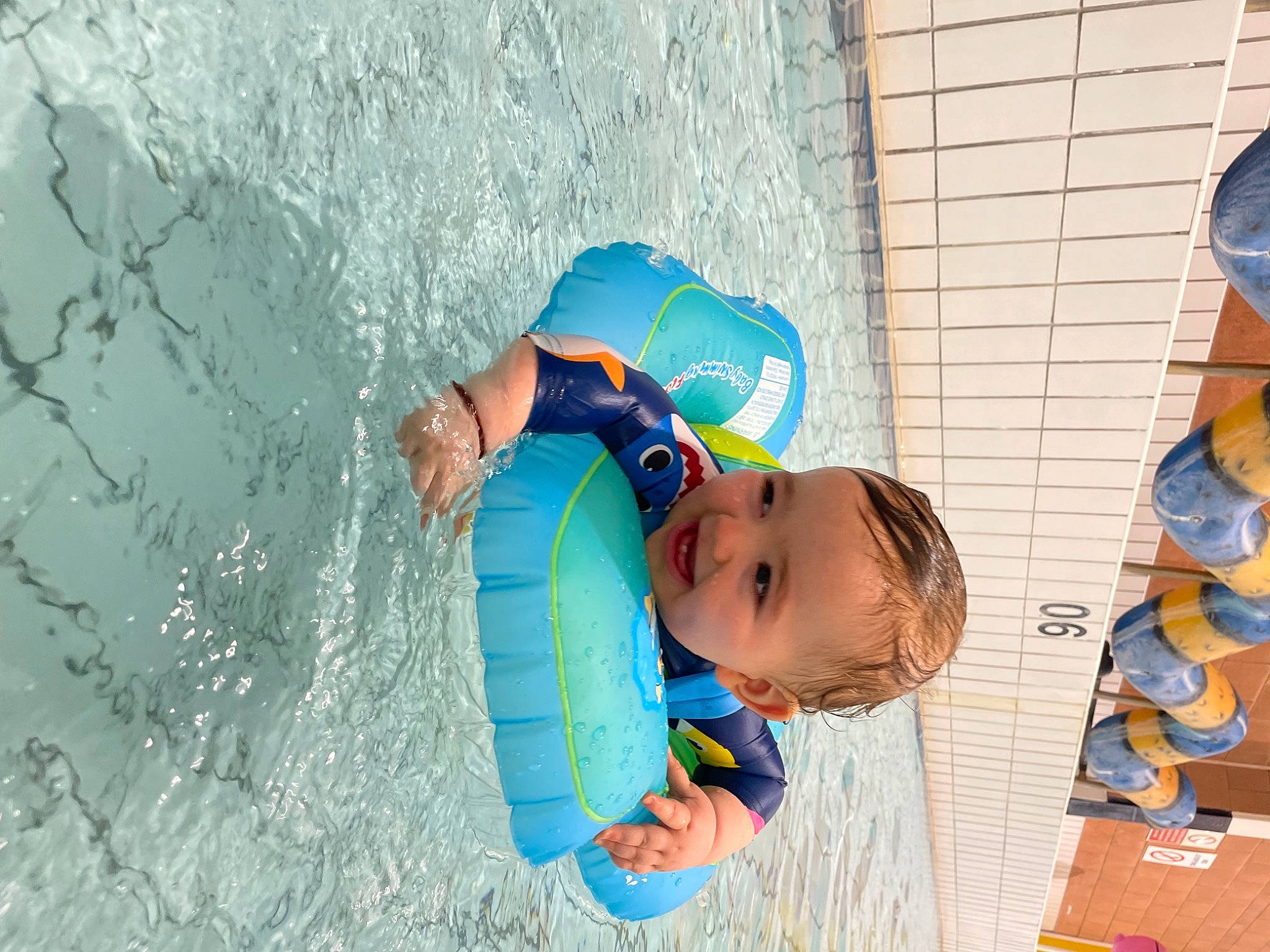 Koby is registered to the contest to win money with this photo: azure, baby, baby_products, baby_toddler_clothing, child, fun, happy, hat, leisure, person, personal_protective_equipment, play, recreation, swimming_pool, toddler, vacation, visual_arts, water, world