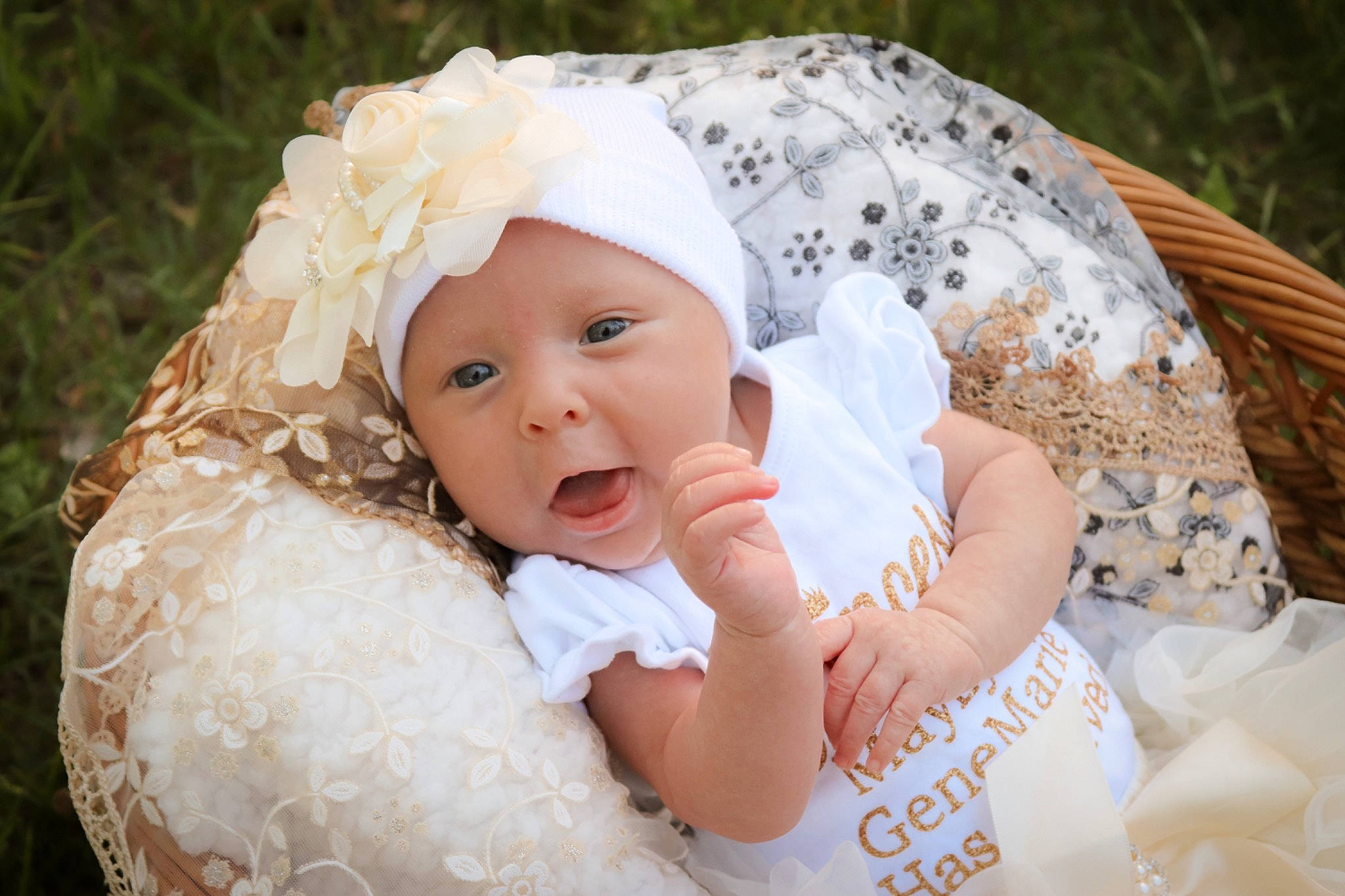 Maylynn joined the competition — help win amazing prizes! baby, baby_toddler_clothing, cap, cheek, child, comfort, flash_photography, grass, hair_accessory, happy, headgear, headpiece, headwear, iris, linens, lip, pattern, person, plant, skin