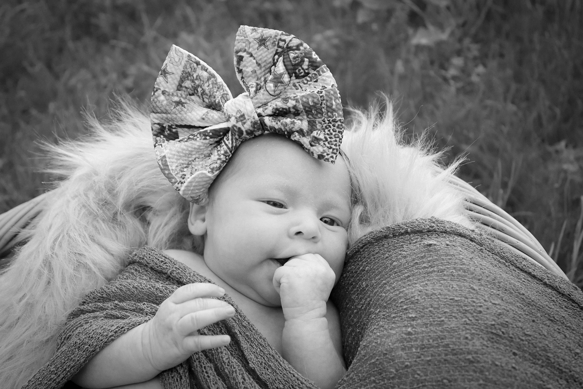 Maylynn is registered to the contest to win money with this photo: baby, cap, child, costume_hat, event, fashion_accessory, flash_photography, fur, gesture, grass, happy, headband, headpiece, iris, monochrome, monochrome_photography, people_in_nature, person, skin, style