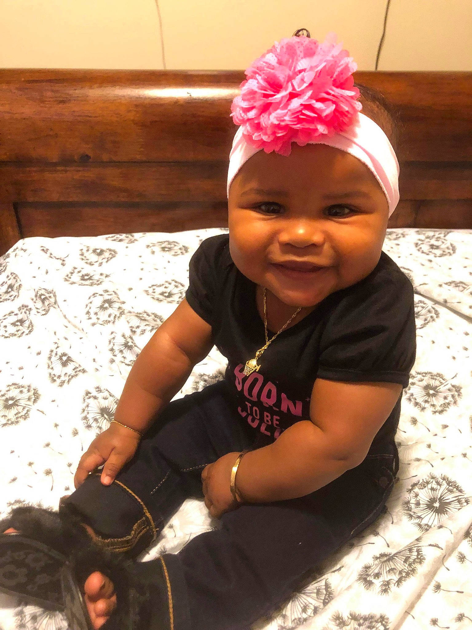 Malani joined the competition — help win amazing prizes! baby, bonnet, child, fashion_accessory, hair_accessory, headband, headgear, headwear, person, pink, smile, toddler, turban