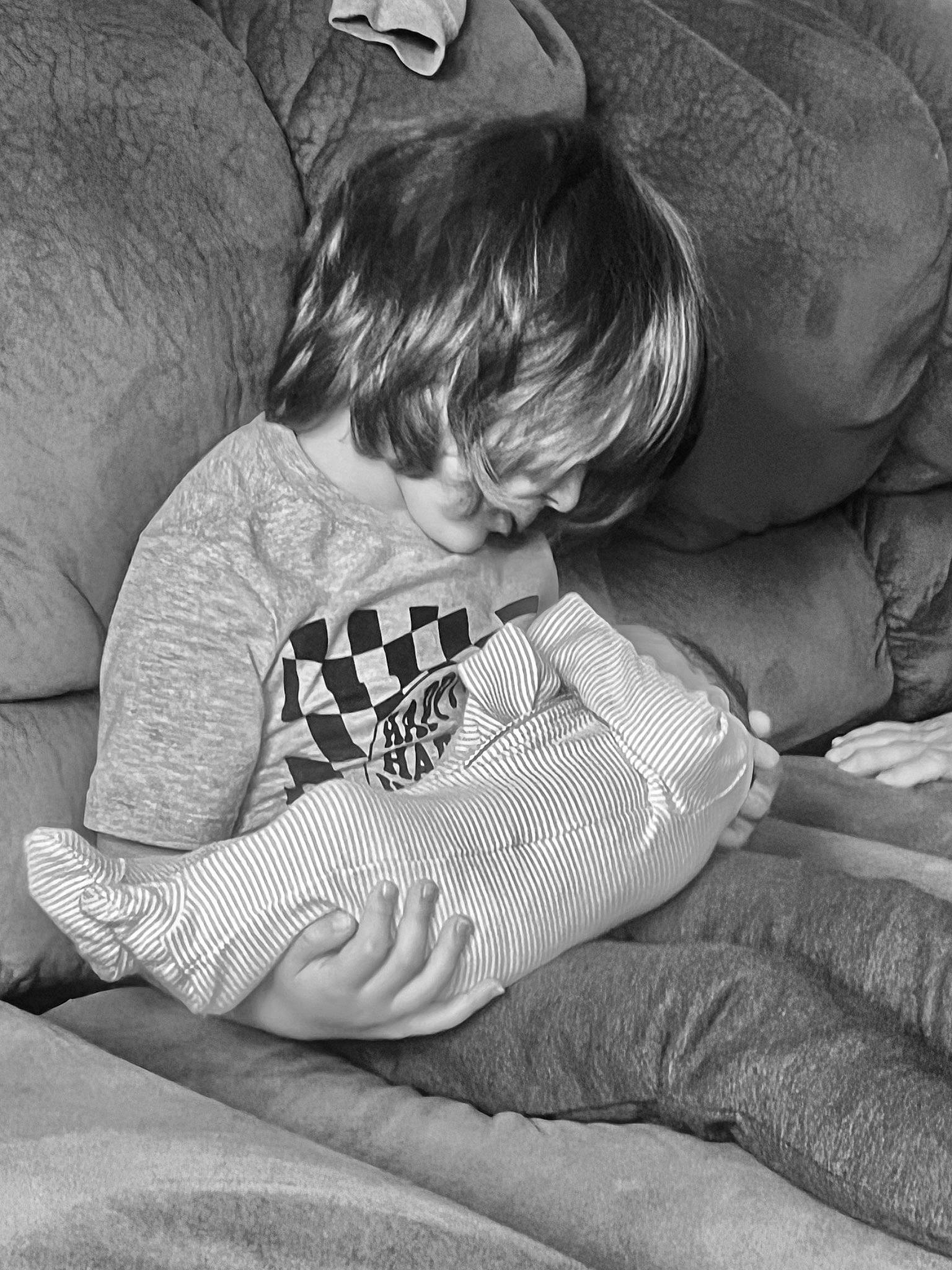 Jalen joined the competition — help win amazing prizes! arm, baby, baby_toddler_clothing, black, black_and_white, child, comfort, elbow, gesture, grey, hairstyle, human, human_leg, knee, leg, monochrome, monochrome_photography, person, sitting, sleeve