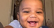 Samaan joined the competition — help win amazing prizes! baby, child, smiling, laughing, portrait, selfie, face, eyes, teeth, hair, infant, indoors, home, bedroom, striped_shirt, clothing, close_up, happy, sitting, photography