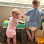 Rilynn joined the competition — help win amazing prizes! toddler, baby, child, toy, indoor, carpet, window, play, onesie, diaper, curious, standing, light, furniture, colorful, plastic, feet, hair, person, room