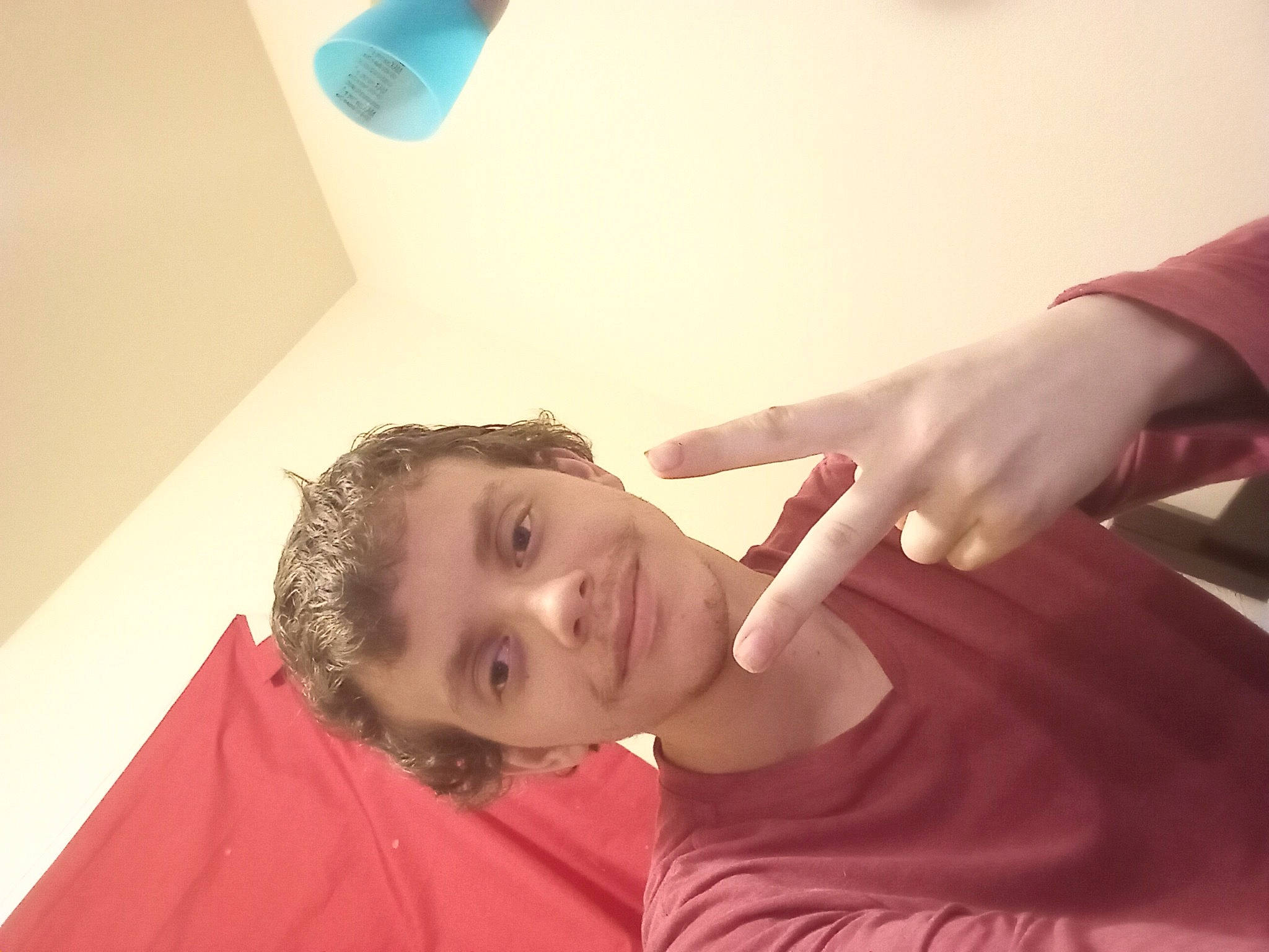 Shane joined the competition — help win amazing prizes! beauty, brown_hair, comfort, elbow, finger, fun, gesture, happy, human_leg, joint, joy, knee, lighting, long_hair, neck, orange, person, room, sitting, sleeve