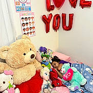 Viviana joined the competition — help win amazing prizes! child, sleeping, stuffed_animals, teddy_bear, balloons, love_balloons, bedroom, blanket, pillow, plush_toys, pink_bed, wall_posters, red_tutu, hello_kitty, elsa_doll, cozy, indoor, curtain, happy, cute