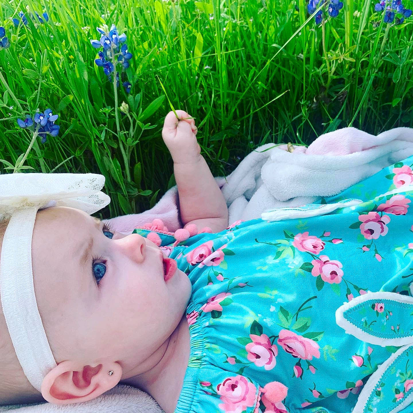 Quinnlee is registered to the contest to win money with this photo: baby, child, flower, grass, grass_family, green, hand, happy, headwear, leg, leisure, meadow, person, photography, plant, play, product, skin, summer, toddler
