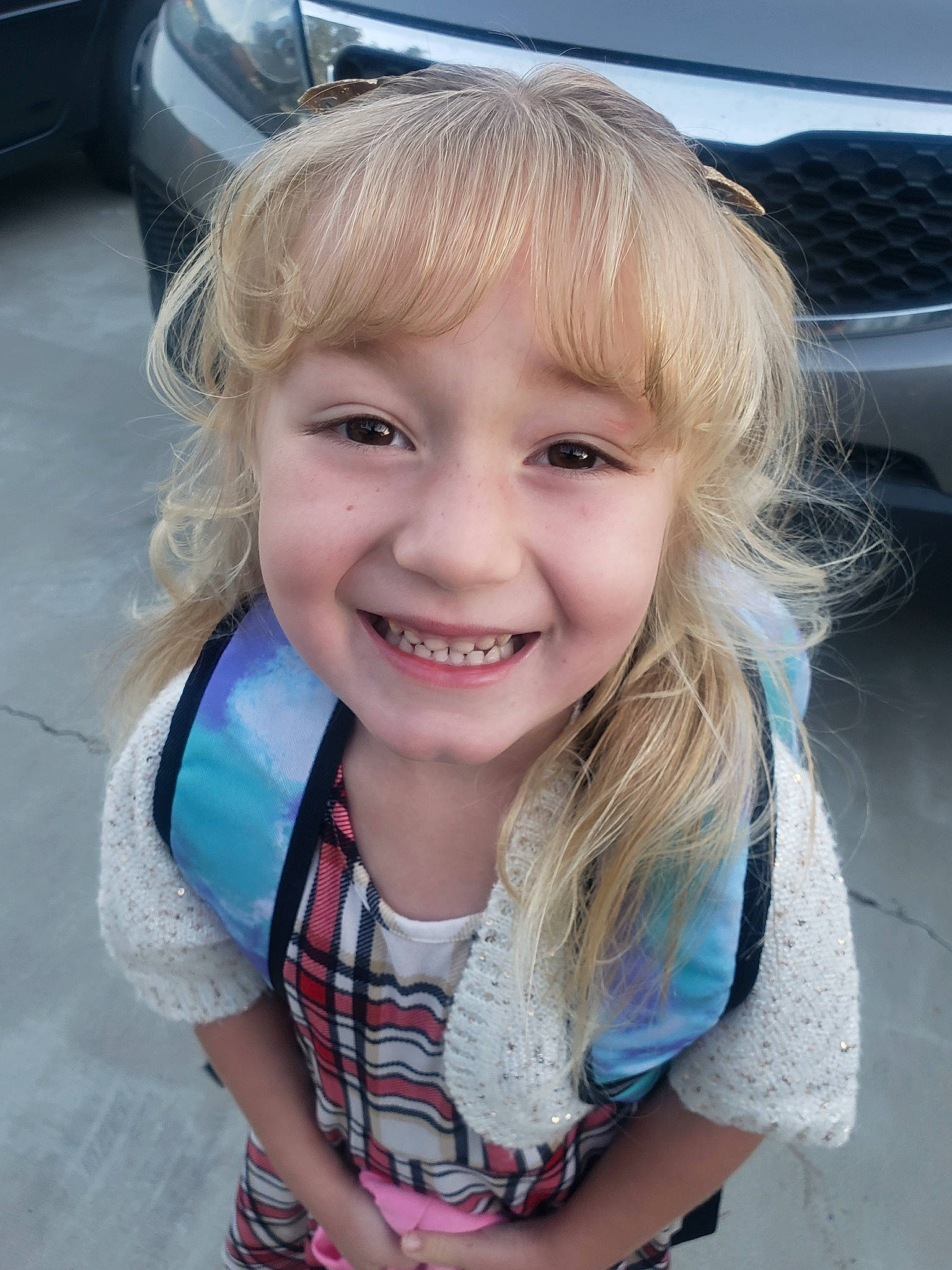 Evelynn joined the competition — help win amazing prizes! automotive_exterior, automotive_lighting, automotive_tire, blond, bumper, car, electric_blue, eyebrow, fun, happy, hood, iris, joy, lip, motor_vehicle, person, personal_luxury_car, rim, skin, smile