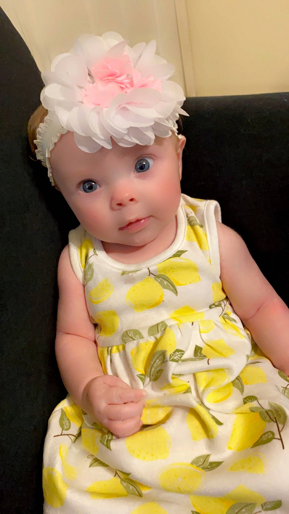 Nova is registered to the contest to win money with this photo: baby, baby_products, baby_toddler_clothing, chair, cheek, child, chin, day_dress, dress, eye, head, headband, headpiece, headwear, lip, person, pink, skin, sleeve, toddler