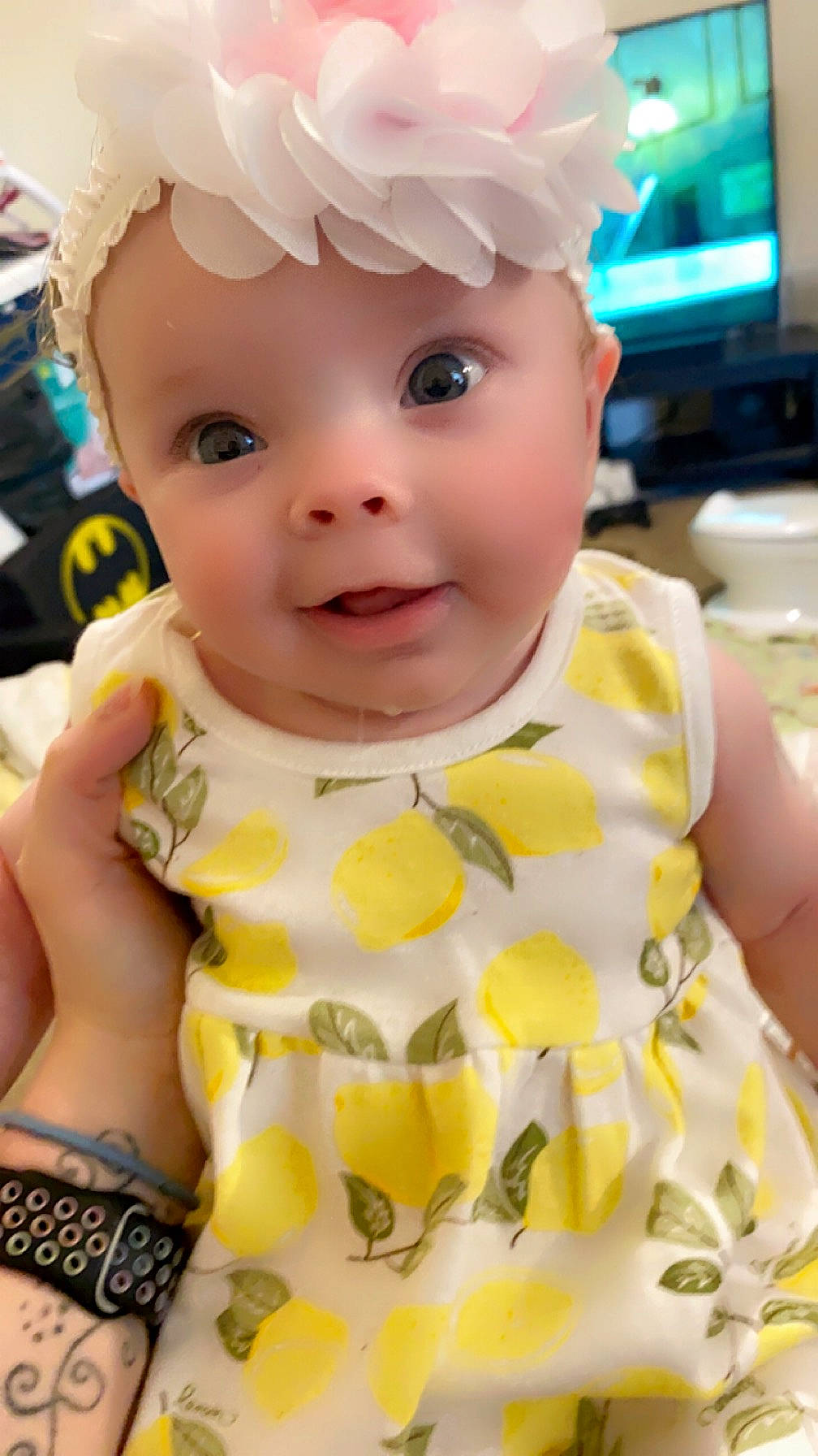 Nova is registered to the contest to win money with this photo: baby, baby_toddler_clothing, cap, cheek, child, computer_keyboard, costume_hat, day_dress, dress, fashion_accessory, fun, hairstyle, happy, headwear, pattern, person, pink, skin, sleeve, smile