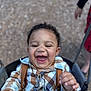 toddler, child, swing, smiling, laughing, plaid_shirt, suspenders, outdoor, playground, happy, face, person, baby, clothing, joyful, fun, park, cute, young_child, portrait