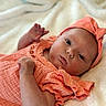 Clara joined the competition — help win amazing prizes! baby, infant, headband, coral_clothing, blanket, soft_texture, cute, lying_down, portrait, child, newborn, face, expression, indoors, sleepwear, comfortable, skin, toddler, resting, closeup