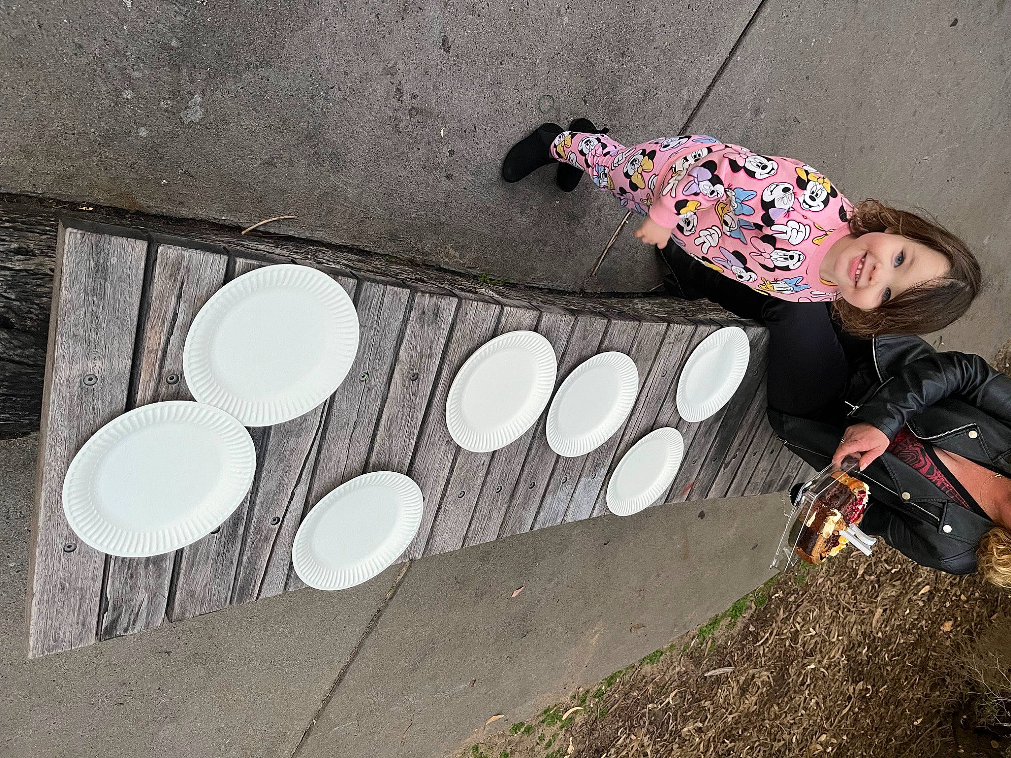 Amilia joined the competition — help win amazing prizes! asphalt, boot, circle, concrete, human_leg, joy, leisure, pattern, person, recreation, road_surface, sandal, shadow, sidewalk, sitting, street, thigh, tints_and_shades, tree, visual_arts