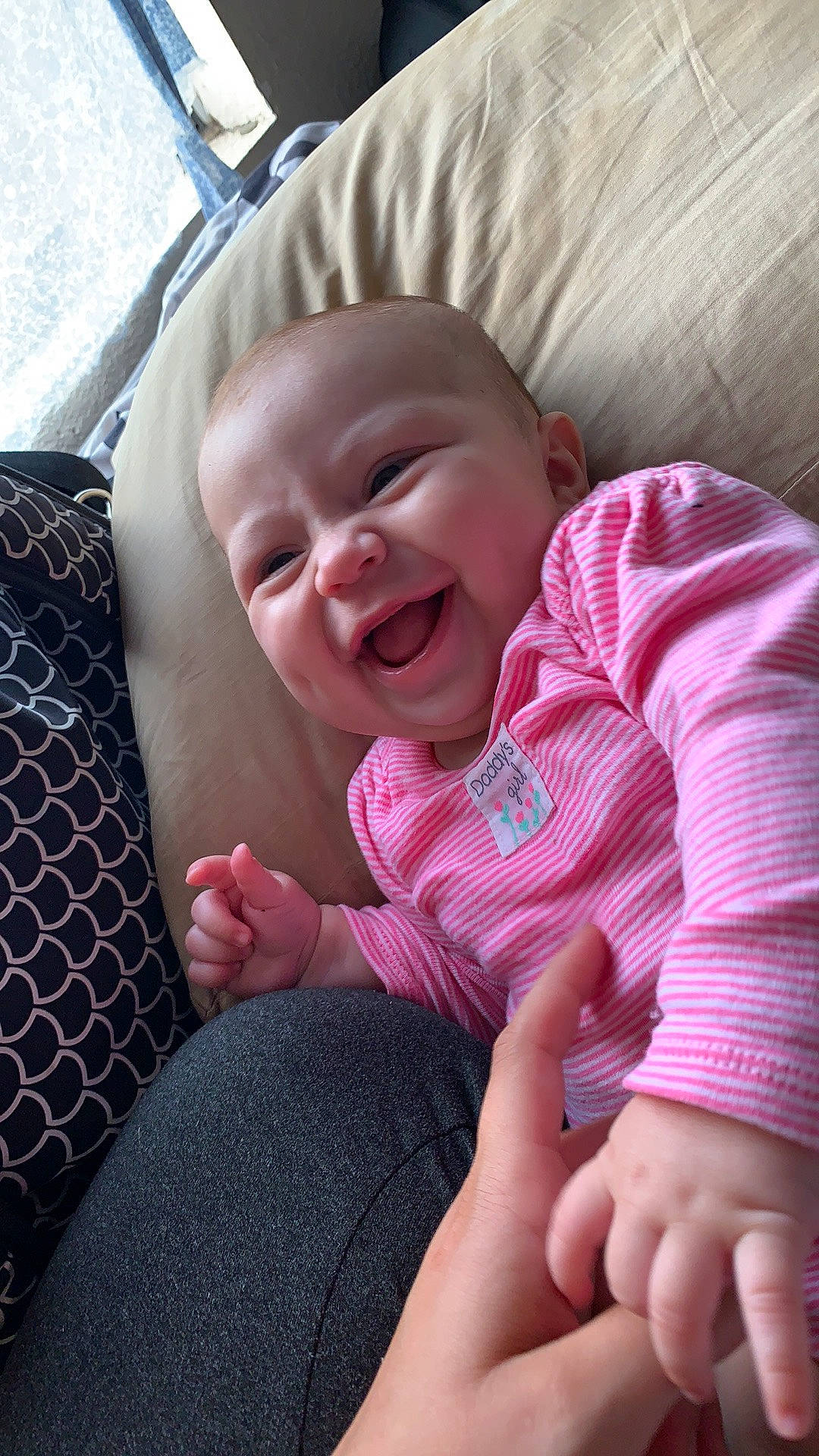 Meilani is registered to the contest to win money with this photo: baby, car_seat, cheek, child, comfort, facial_expression, finger, gesture, hand, mouth, nap, nose, person, skin, sleep, smile, toddler