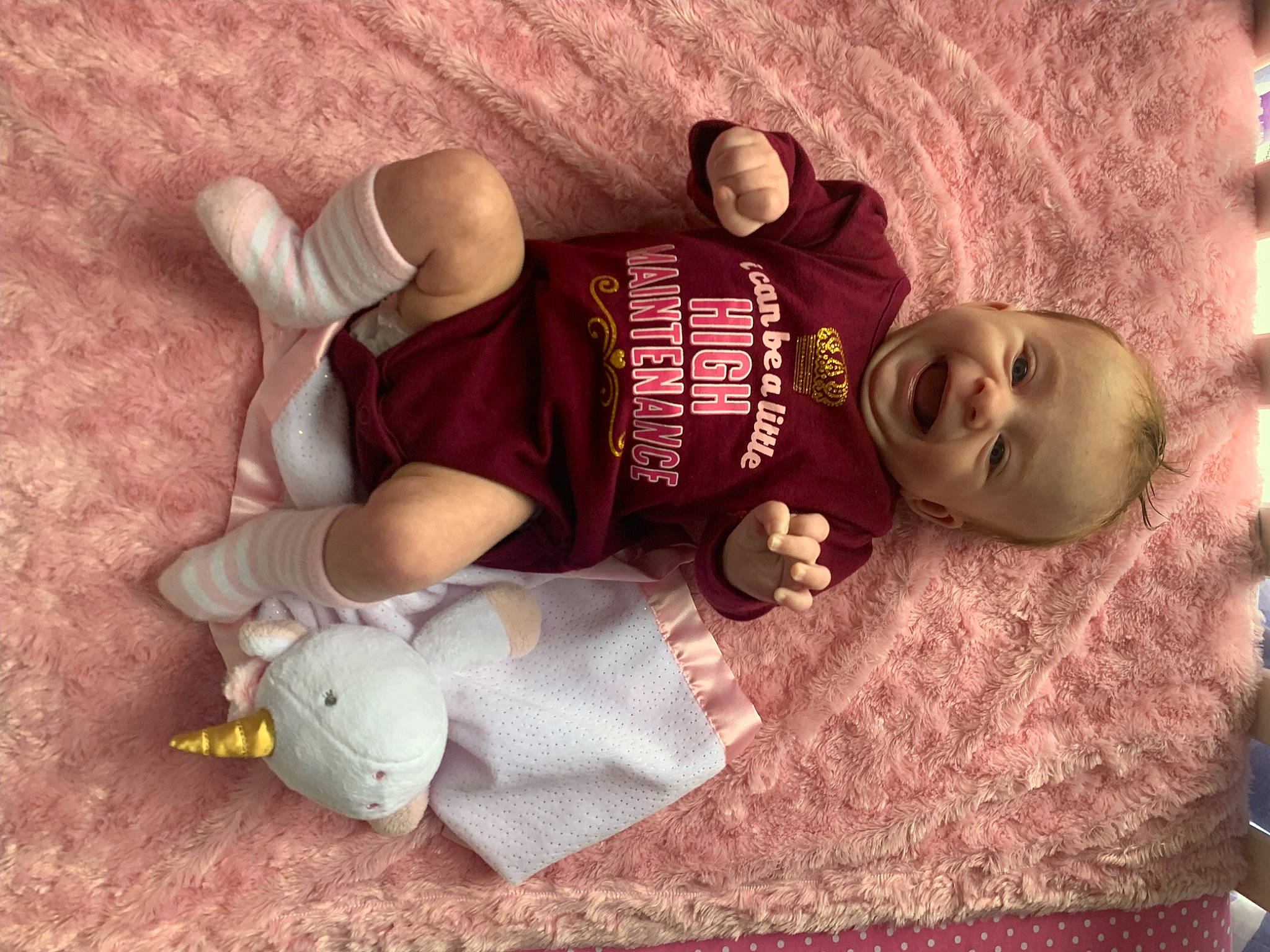 Crystal joined the competition — help win amazing prizes! baby, baby_sleeping, baby_toddler_clothing, child, comfort, facial_expression, finger, flooring, fun, happy, hat, human_body, linens, mammal, person, sitting, sleeve, t_shirt, toddler, vertebrate