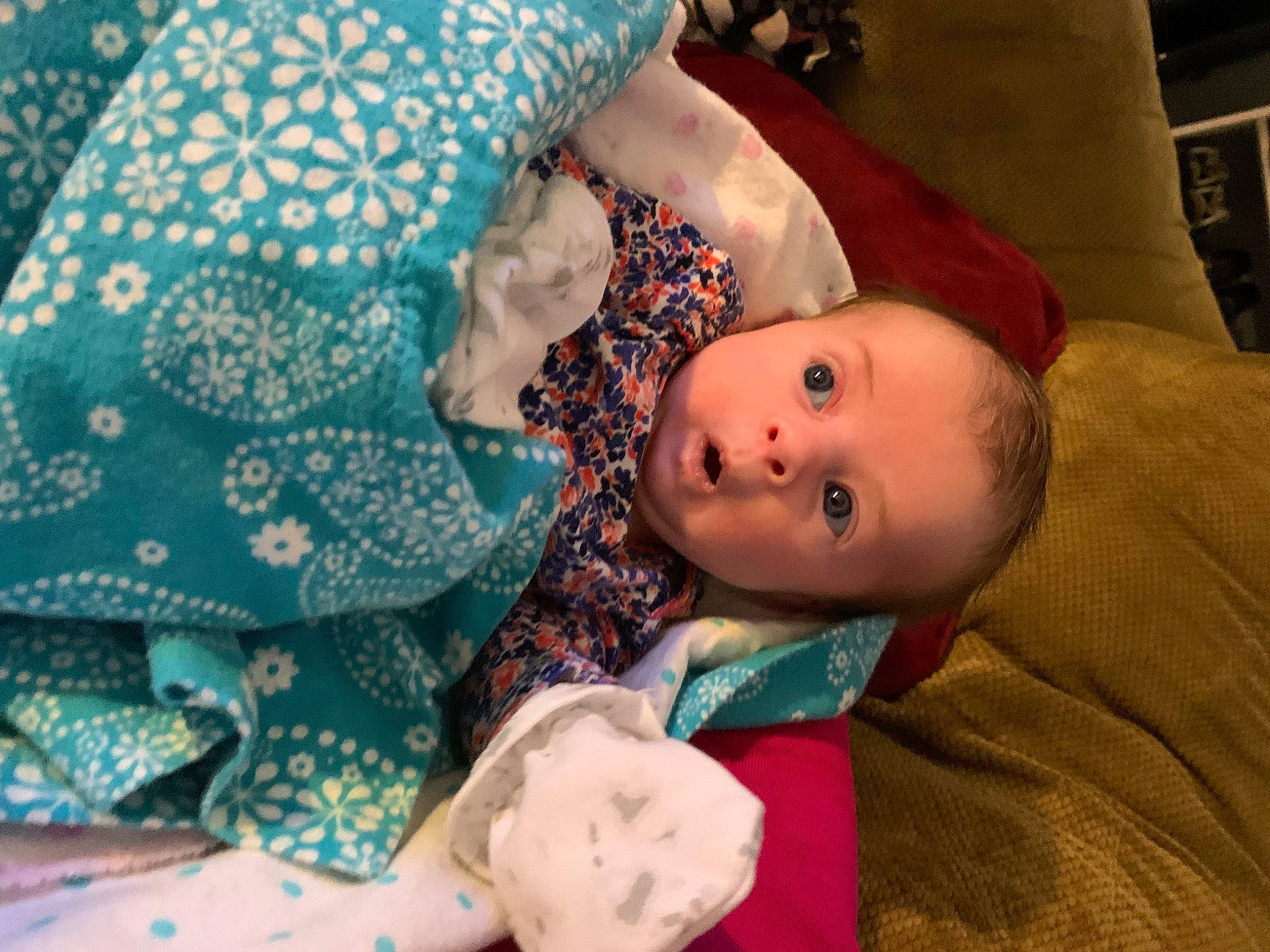 Crystal is registered to the contest to win money with this photo: baby, baby_products, baby_safety, baby_toddler_clothing, bedtime, cheek, child, comfort, hat, headgear, human, human_body, linens, mouth, pattern, person, room, skin, surprise, textile