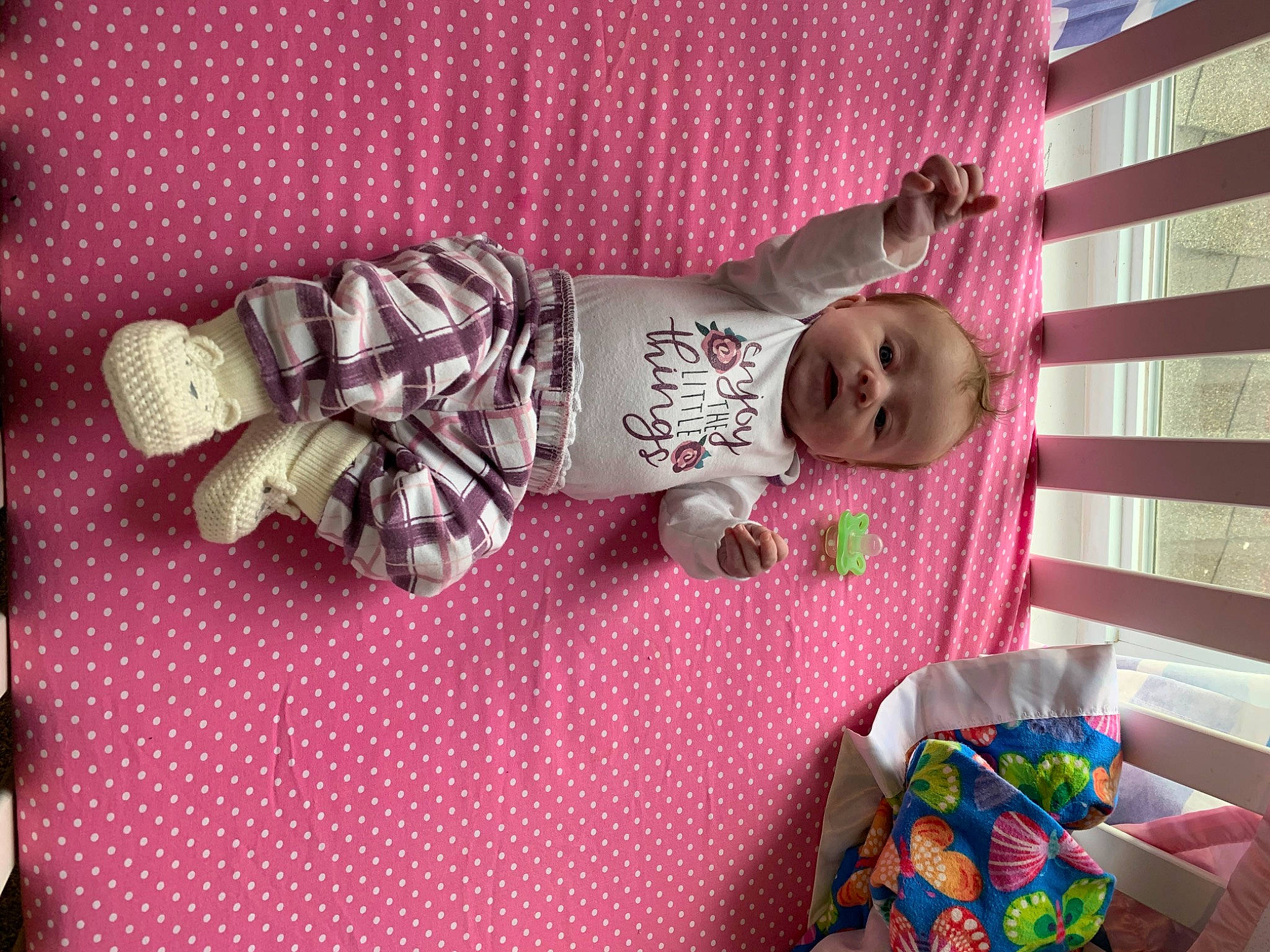 Crystal is registered to the contest to win money with this photo: baby, baby_products, baby_safety, baby_toddler_clothing, baby_toys, child, hand, head, human_body, linens, magenta, pattern, person, pink, purple, room, smile, sock, toddler, toy