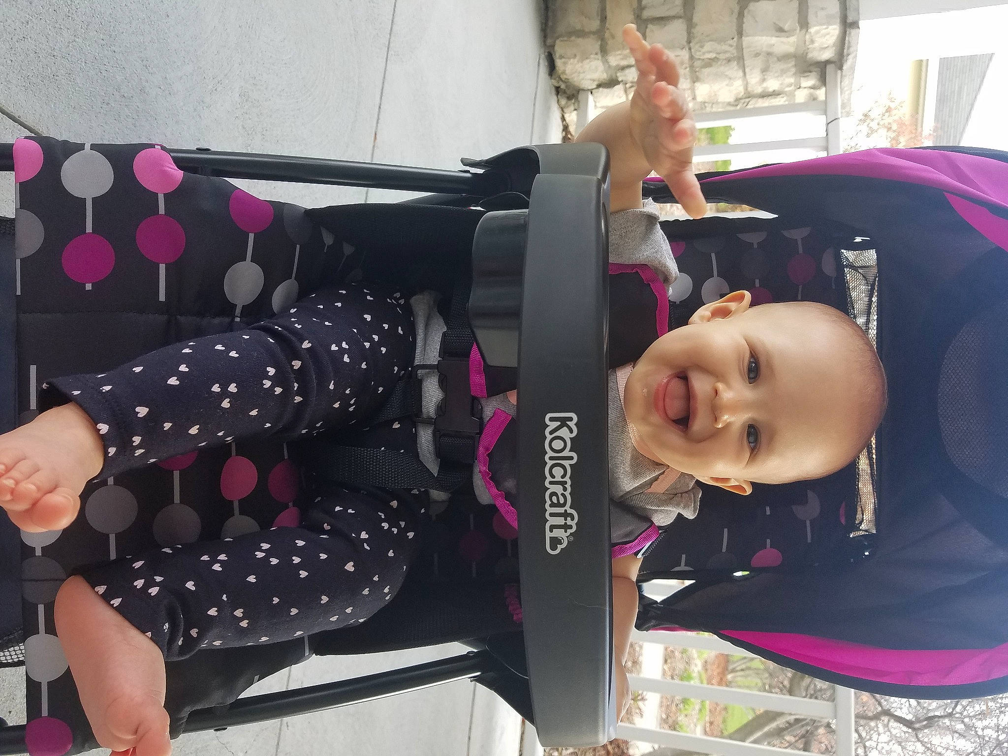 Jayda is registered to the contest to win money with this photo: baby_products, child, event, fashion_accessory, fun, happy, joy, magenta, pattern, person, pink, purple, sleeve, smile, street_fashion, t_shirt, textile, thigh, toddler, tree