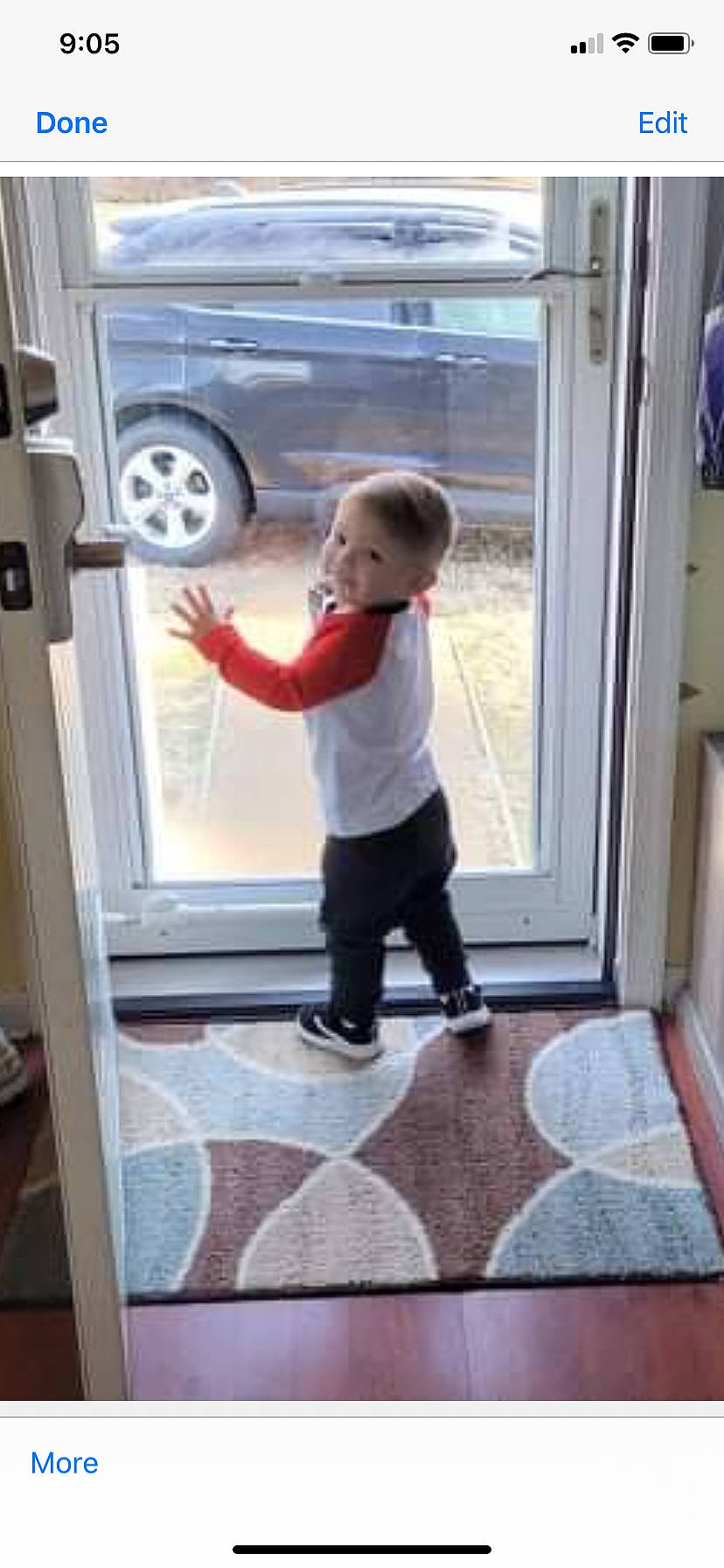 Brentley is registered to the contest to win money with this photo: automotive_exterior, baby, baby_toddler_clothing, child, door, fixture, floor, flooring, glass, home_door, interior_design, person, product, room, standing, tire, toddler, vehicle_door, wheel, window