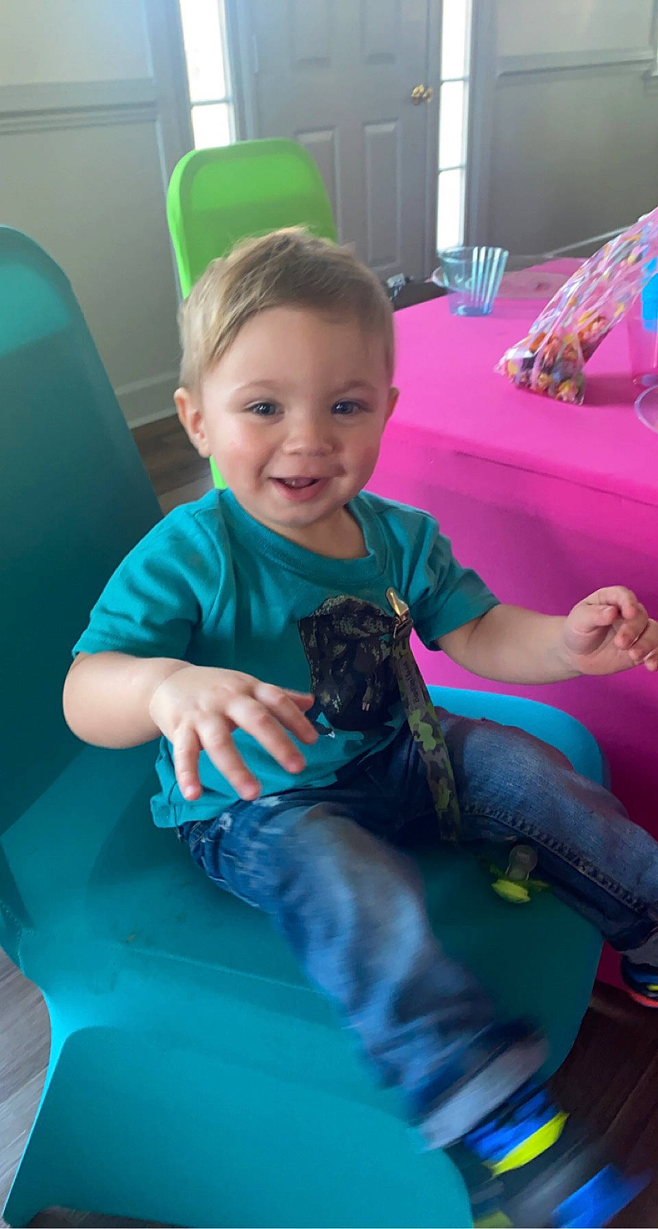 Brentley joined the competition — help win amazing prizes! baby, baby_toddler_clothing, chair, child, finger, fun, green, happy, joy, lap, leisure, mammal, nail, person, recreation, sitting, skin, smile, t_shirt, thigh