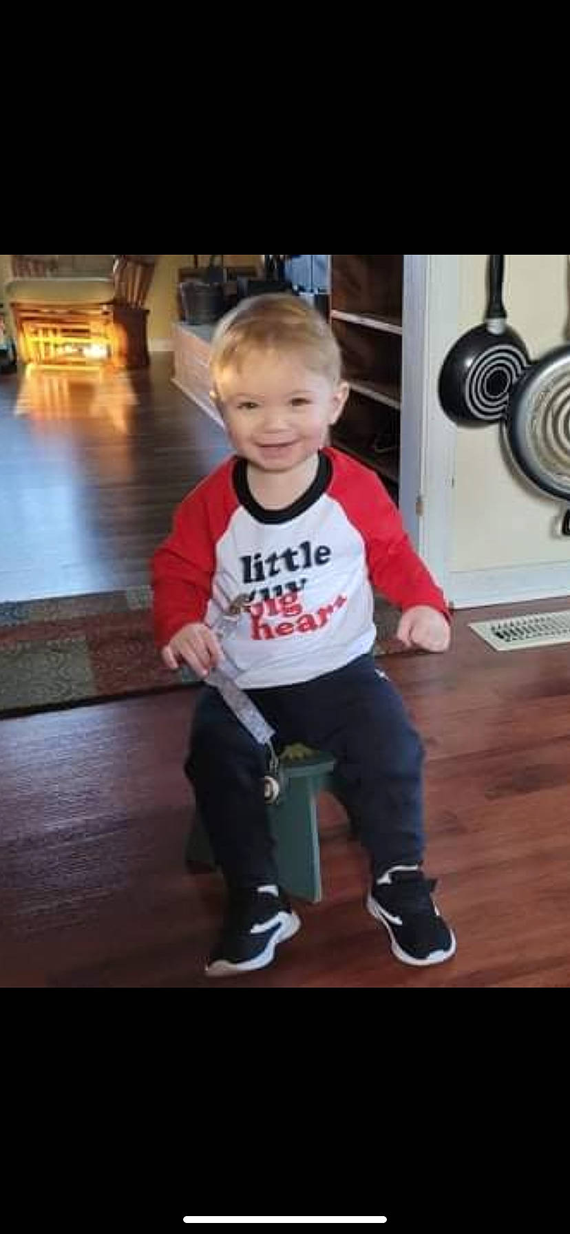 Brentley joined the competition — help win amazing prizes! automotive_tire, baby_toddler_clothing, child, cool, floor, flooring, fun, happy, hardwood, joy, leg, person, shoe, sitting, sleeve, smile, sneakers, sportswear, standing, t_shirt