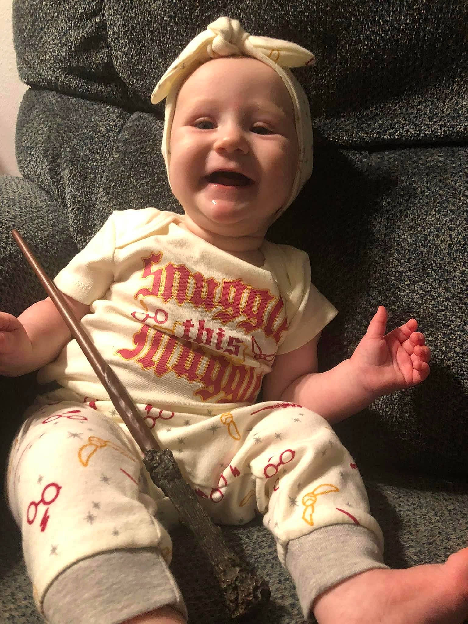 Lainey is registered to the contest to win money with this photo: baby, baby_toddler_clothing, cheek, comfort, cool, facial_expression, finger, glasses, hairstyle, hand, happy, lap, lip, mouth, organ, person, product, skin, sleeve, smile