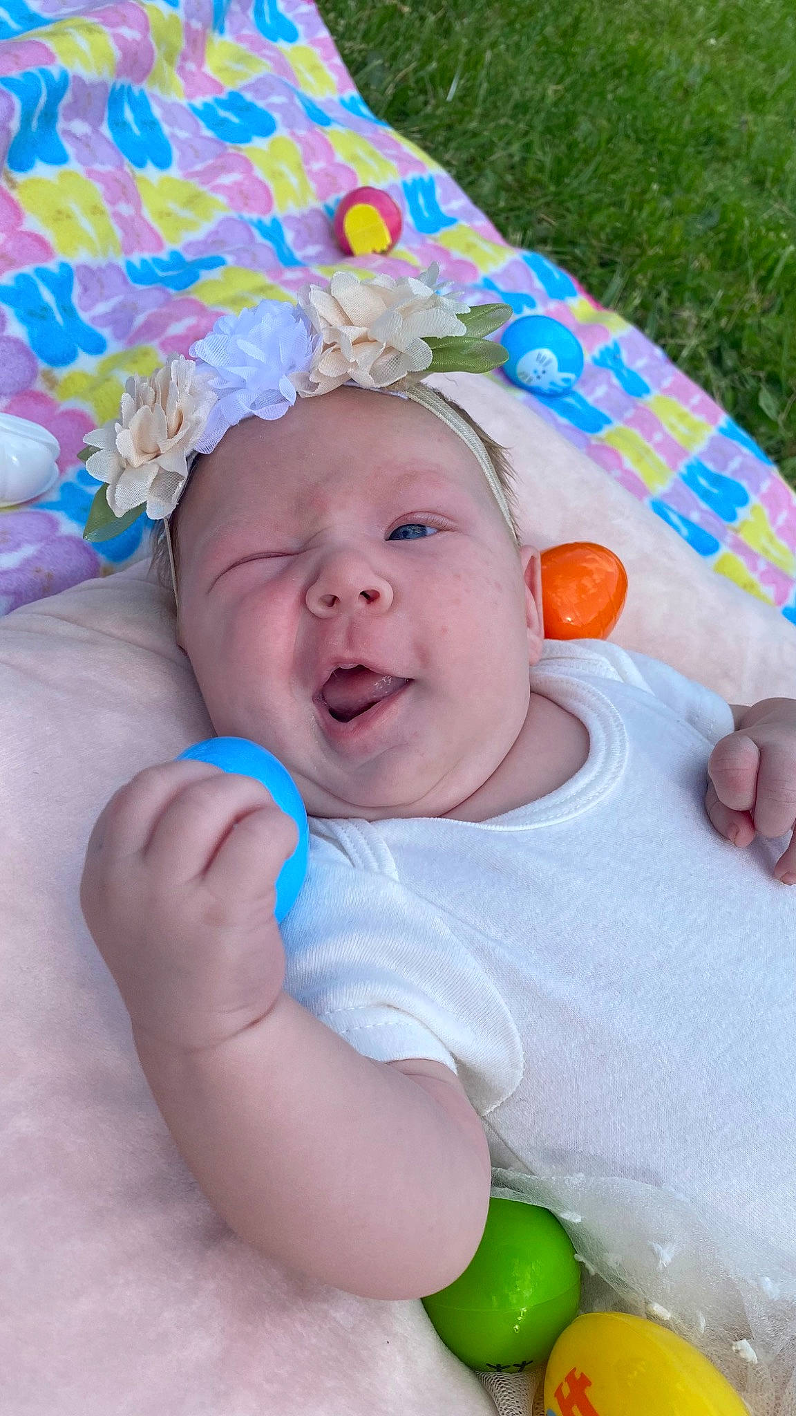 Gabriella joined the competition — help win amazing prizes! baby, baby_playing_with_toys, baby_products, baby_toddler_clothing, child, comfort, facial_expression, fashion_accessory, finger, fun, grass, happy, linens, party_supply, person, pink, play, skin, smile, toddler