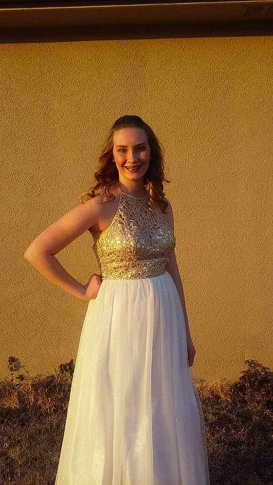 Haylee is registered to the contest to win money with this photo: a_line, beauty, bridal_clothing, bridal_party_dress, clothing, cocktail_dress, dress, event, fashion, fashion_design, formal_wear, gown, haute_couture, joint, joy, lady, long_hair, person, photo_shoot, shoulder