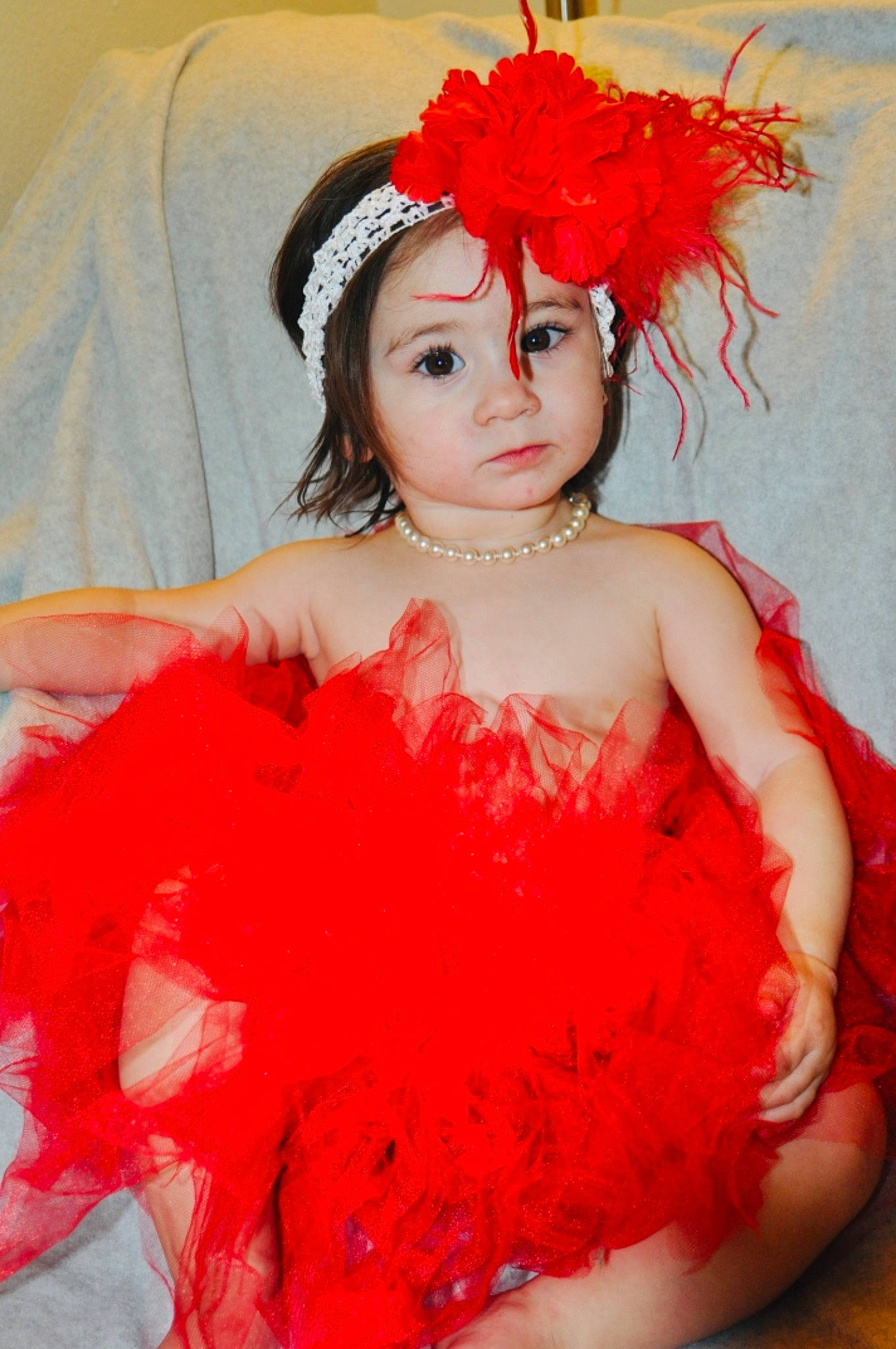 Emberlynn is registered to the contest to win money with this photo: costume, costume_accessory, day_dress, embellishment, eyelash, fashion, feather_boa, fur, hair_accessory, headband, headgear, headpiece, headwear, lip, lipstick, makeover, model, mouth, person, photo_shoot