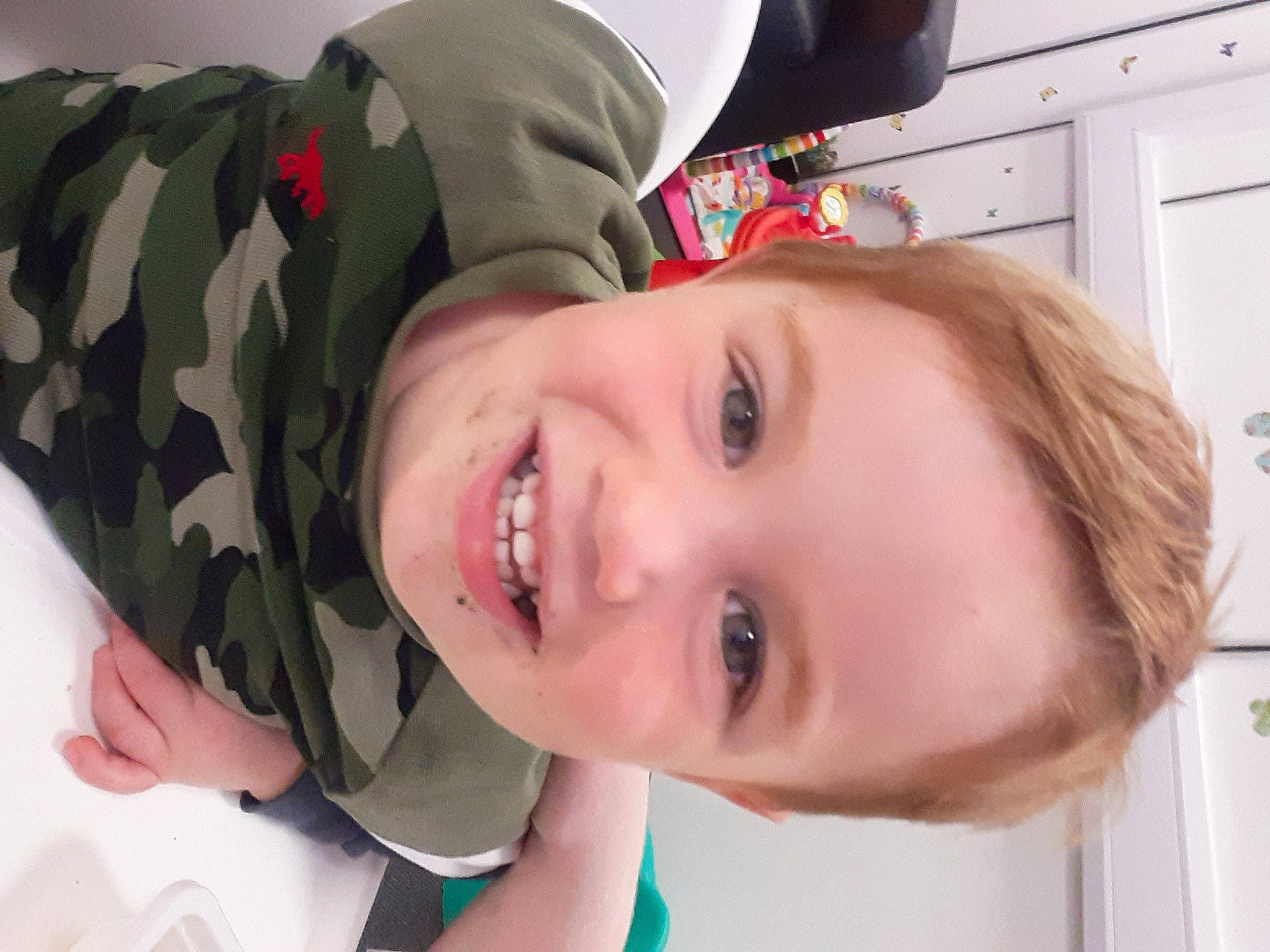 Tommy Craig joined the competition — help win amazing prizes! baby, baby_toddler_clothing, camouflage, cheek, chin, eyebrow, eyelash, facial_expression, gesture, happy, hat, joy, lip, mammal, mouth, nose, person, skin, sleeve, smile