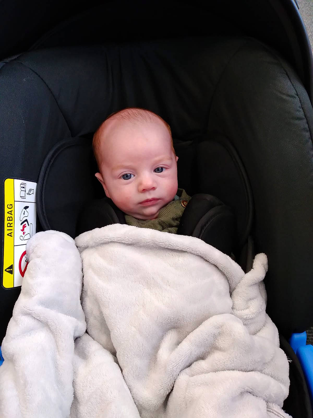 Tommy Craig is registered to the contest to win money with this photo: auto_part, automotive_design, baby, baby_in_car_seat, baby_products, baby_sleeping, baby_toddler_clothing, car_seat, car_seat_cover, cheek, child, comfort, finger, gesture, head, linens, person, sitting, skin, thumb