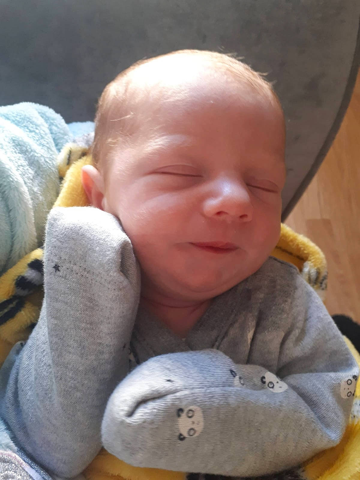 Tommy Craig joined the competition — help win amazing prizes! baby, baby_products, baby_toddler_clothing, cheek, chin, comfort, ear, finger, gesture, human_body, mouth, nose, person, sitting, skin, snout, thumb, toddler, toy, wood