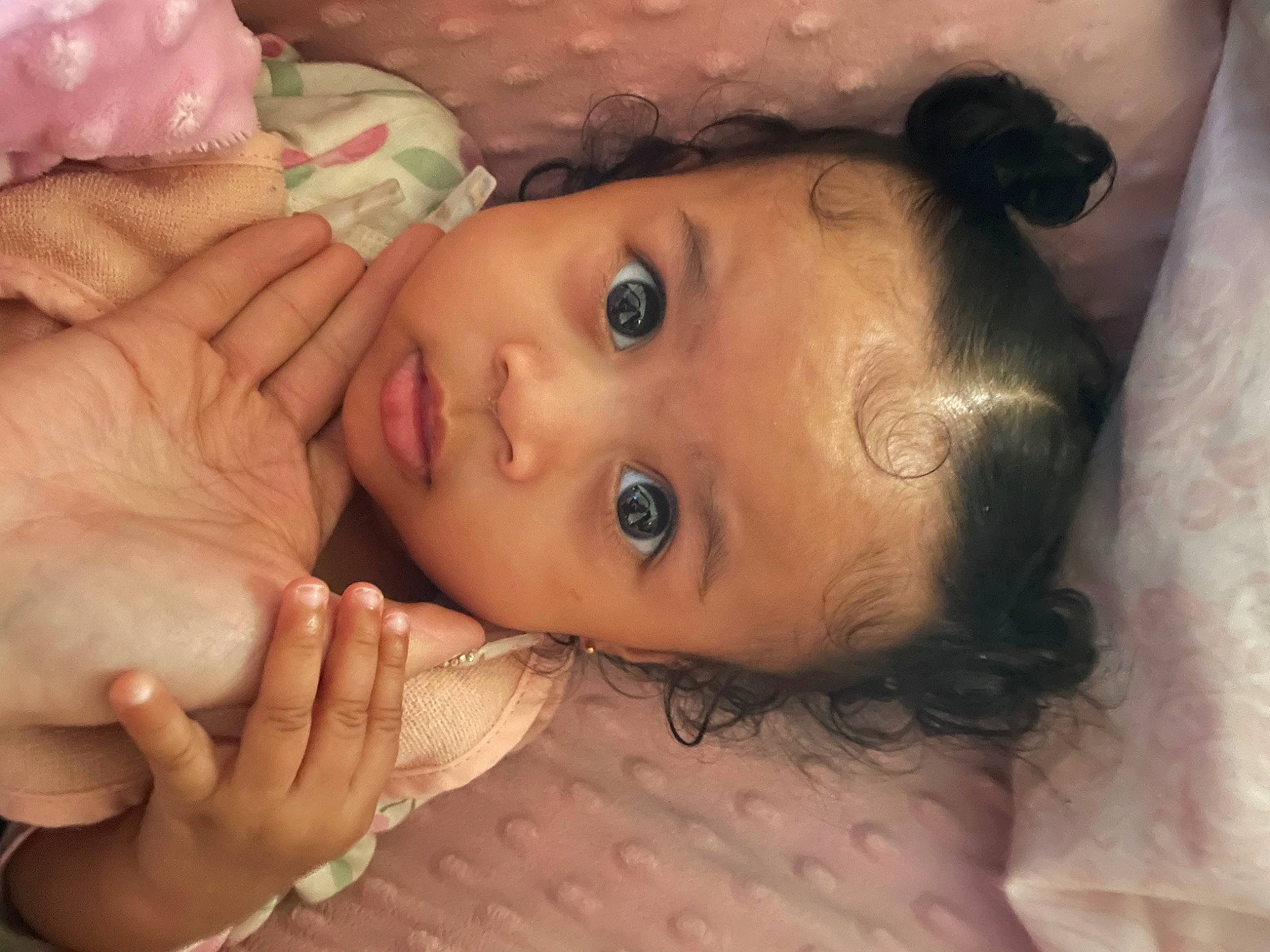 Jayla is registered to the contest to win money with this photo: arm, baby, cheek, chin, dress, eye, eyebrow, eyelash, facial_expression, finger, gesture, hair, head, iris, lip, mouth, neck, nose, person, pink
